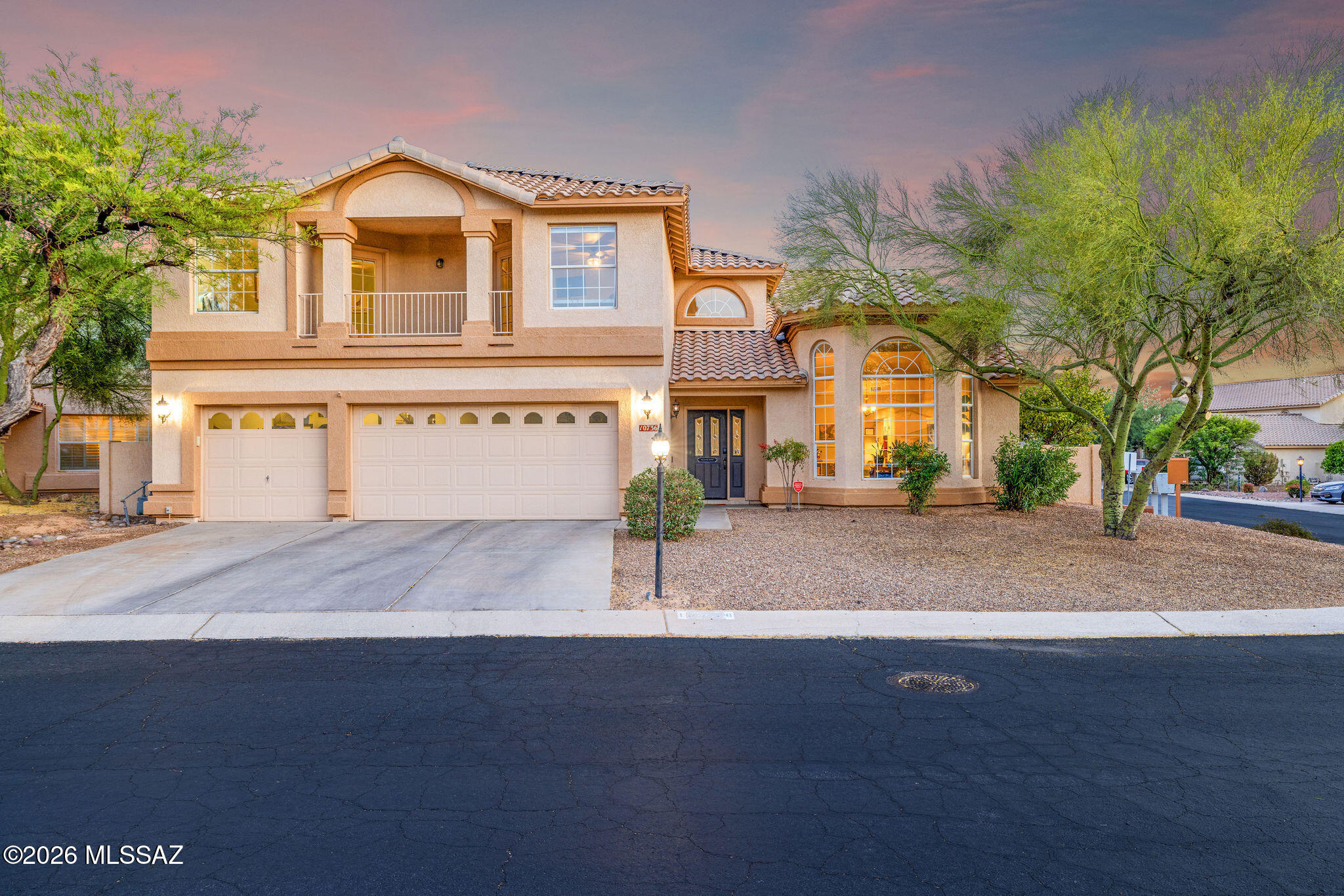 Welcome to this beautifully maintained home nestled in the desirable Cañada Hills community of Oro Valley. From the moment you arrive at 10736 North Torey Lane, you'll notice the exceptional care and pride of ownership that make this property truly stand out.
Step inside to discover spacious living areas designed for both comfort and entertaining. The thoughtfully designed kitchen showcases granite countertops, a stylish backsplash, stainless steel appliances, and ample cabinetry perfectly blending functionality with modern elegance. The downstairs offers a spacious family room and separate living room, along with a private en suite bedroom with its own backyard access--ideal for guests, multi-generational living, or a home office. Upstairs, you'll find three additional bedrooms plus a generously sized primary suite, providing plenty of space for everyone. Designed with entertaining in mind, the home also features a wet bar and seamless indoor-outdoor flow.
Step outside to your own resort-style backyard oasis, complete with a sparkling pool and spa, expansive patio space, and plenty of room to relax or host gatherings. Whether enjoying Arizona sunsets or taking in the views from one of two observation decks, this home delivers a true desert lifestyle experience. Situated on a wonderful corner lot and complete with a three-car garage, this property offers both space and convenience.
This is a rare opportunity to own a meticulously maintained home in one of Oro Valley's most sought-after neighborhoods combining comfort, style, and exceptional outdoor living.
