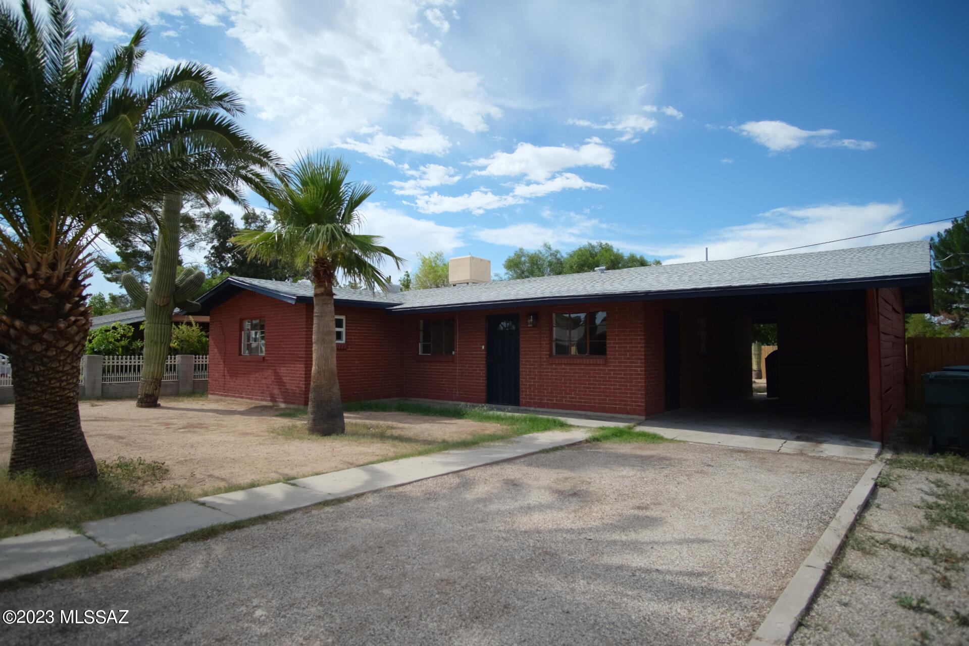 Text for more info/walkthrough video. Central Tucson Renovated 3 Bedroom/2 Bathroom + AZ Room 1278sf single-story Brick Home features an open floorplan with Modern Finishes + Fixtures throughout; Master BR Suite w/ private Bathroom; Central Air Conditioning; Laundry Room w/ washer + dryer incl; Car Port; Arizona Room; private walled-in Backyard w/ mature Desert vegetation; located on a Cul-De-Sac. Tenant pays all utilities. 1yr minimum Lease, Costs are; non-refundable $50/adult Application, $1695 Security Deposit, $150/pet Pet with approved pet, $400 cleaning. Available immediately.