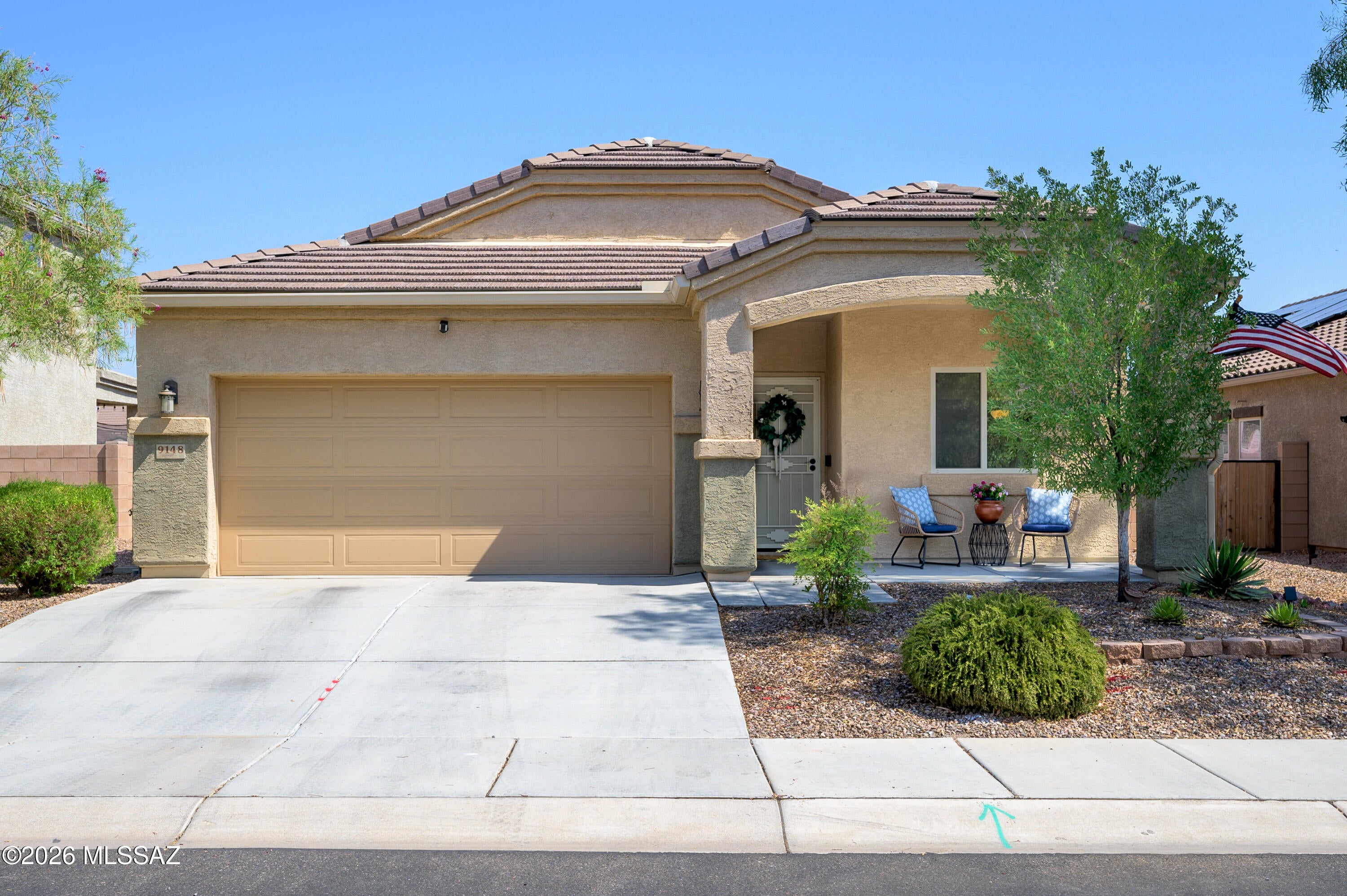 RANGE PRICE: $400,000 - $415,000. Beautifully updated and exceptionally well maintained, this Saguaro Bloom home stands out with custom upgrades, elevated finishes, and thoughtful details throughout. The bright and open interior features no carpet, tile and LVP flooring, painted interior doors, upgraded light fixtures, and designer touches that create a polished yet welcoming feel. At the heart of the home, the magazine-worthy kitchen features granite countertops, a stunning backsplash, high-quality cabinet hardware, a spacious pantry, and a large island with plenty of workspace and room to gather. The thoughtfully designed floor plan offers 3 bedrooms plus a den and 2.5 bathrooms. The primary suite is secluded and feels like a true retreat. The best part? Two separate closets for all of your storage needs. The ensuite features dual sinks and a walk-in shower. Storage is a standout feature throughout the home, with multiple linen and coat closets, plus an extended 2.5-car garage offering additional space for vehicles, storage, hobbies, or recreational equipment. Step outside and enjoy the Arizona lifestyle in a backyard with no rear neighbors and an extended covered patio, creating even more space for outdoor dining, relaxing, and entertaining. Located in highly sought-after Saguaro Bloom, this home offers access to an impressive collection of community amenities surrounded by beautiful desert scenery, including resort-style pools, a splash pad, parks, walking paths, and a fitness center. With its thoughtful updates, elevated finishes, exceptional storage, and meticulous care, this home truly reflects pride of ownership and is ready for its next owner.