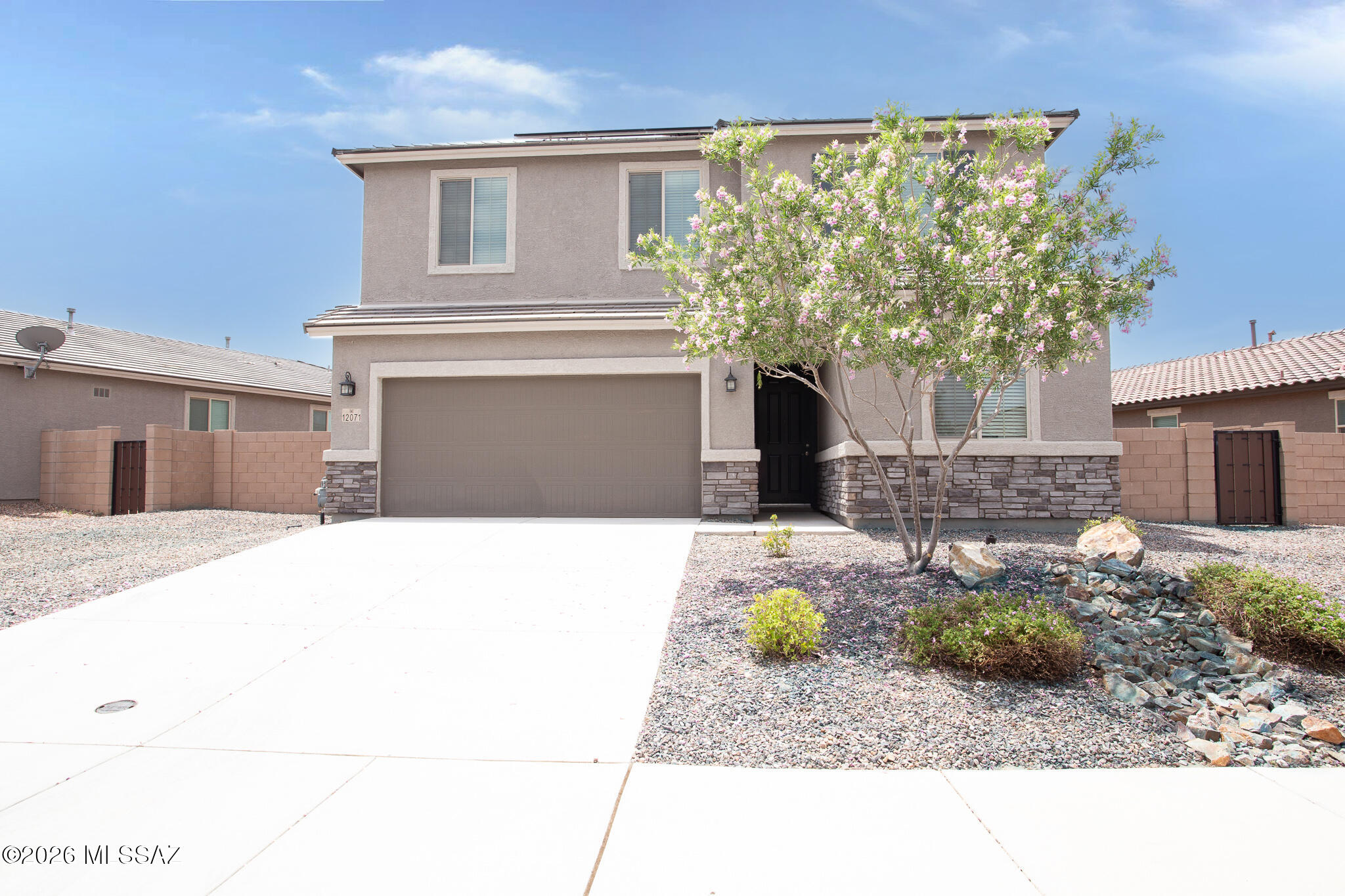 This contemporary home features 4 beds, 2.5 baths, with thoughtful design & quality finishes. Built for modern living, it combines practical layout with reliable construction and is move in ready. The open concept living area flows smoothly, anchored by a kitchen with granite countertops large island & stainless steel appliances. Energy efficient windows reduce utility costs. The primary bathroom includes spacious closet, double vanity and walk-in shower. A dedicated laundry room with extra storage room keeps operations organized. Outside, large backyard with covered patio great for entertaining. Situated in the Vail School District, close to shopping restaurants and much more! Contact Agent today to schedule your showing or for more details. This is a Fannie Mae HomePath property. First Time Buyers, complete the HomePath Ready Buyer course on Homepath.com. Attach certificate to offer up to 3% closing cost assistance. Check HomePath.com for details. Restrictions apply.