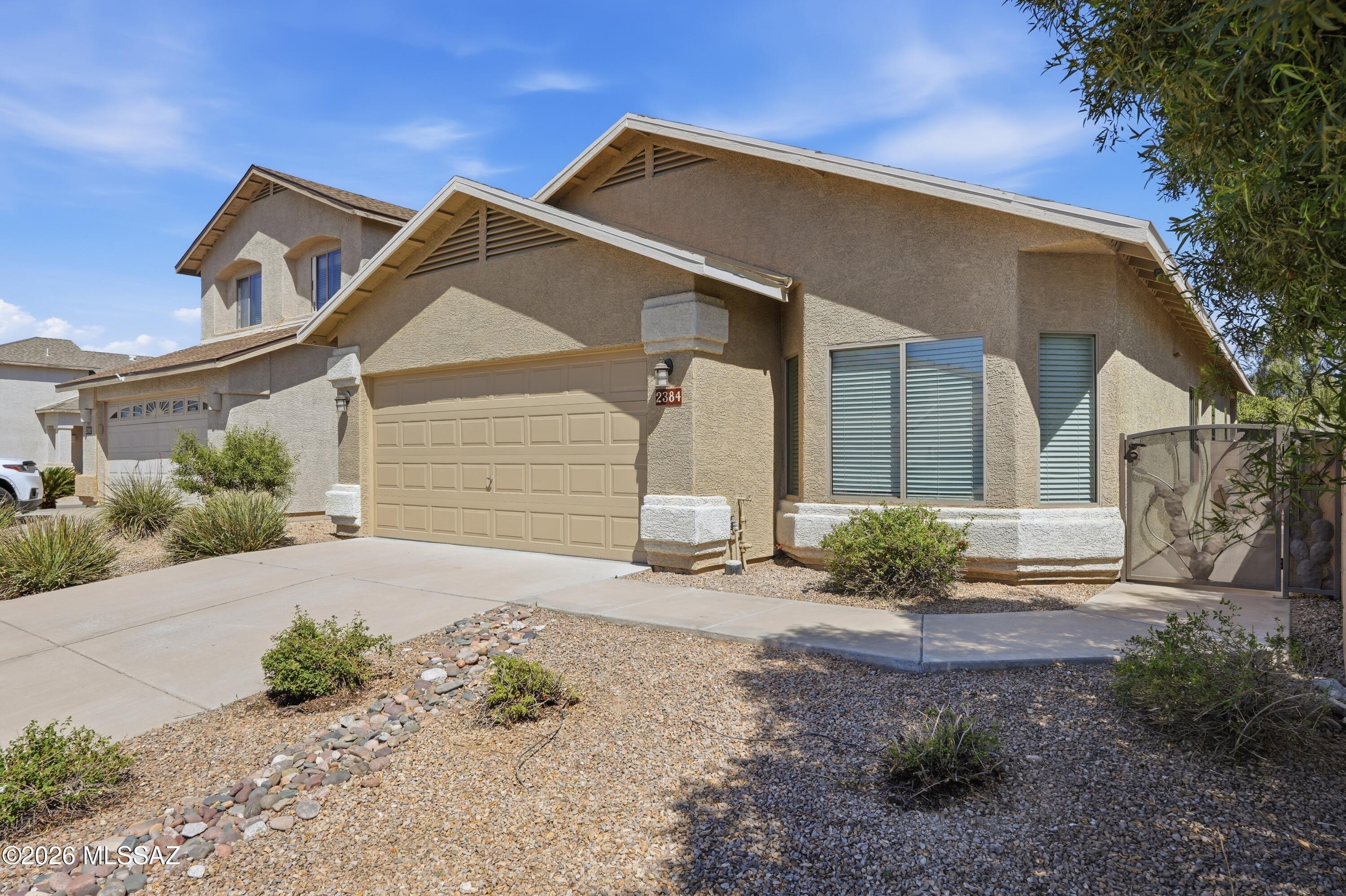 Prime River Rd & La Cholla location! This well maintained home with a NEW Roof 3/26, 3-bedrm, 2-bath, sits on a nice cul-de-sac lot. It features tasteful upgrades throughout. Beautiful ceramic tile flooring in every room (no carpet). A very desirable split floor plan, SS appliances, and a two car garage.
You will enjoy the private secure front entry with a custom entry gate. There is a spacious backyard with plenty of room for your pets or a future swimming pool. Conveniently located near shopping, hospitals, University of AZ and Curtis Park.