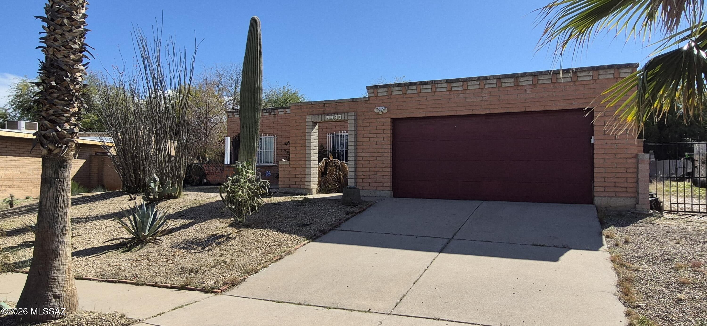 Location, Location, Location. Situated in desirable West Tucson.  This home is minutes from I-10, downtown and UofA.  This 3bed, 2bath home  has a fireplace, enclosed backyard and an existing in-ground pool. Property does require some TLC and updating. HVAC less than 5 years old.