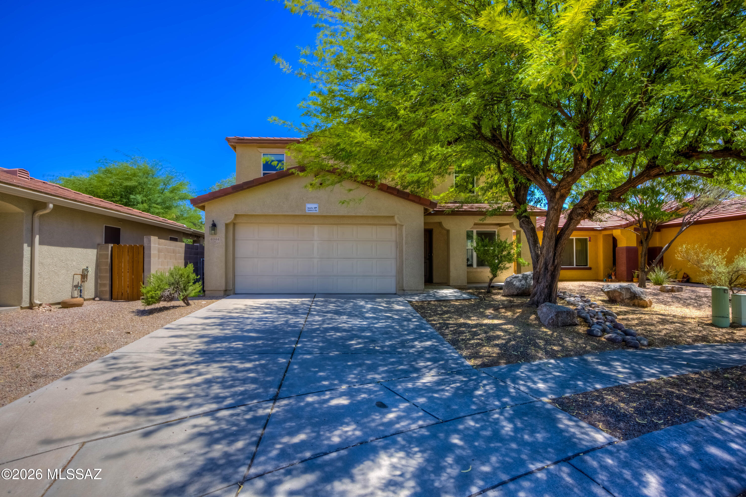 Reduced Price* Welcome home to this beautifully updated home offering an inviting open-concept floor plan. Natural light and modern finishes throughout this diamond. The spacious living and dining areas flow seamlessly into the stunning remodeled kitchen, making this home ideal for both everyday living and entertaining. The remodeled kitchen features quartz countertops, stylish cabinetry, Stainless steel appliances, French door twin cooling Samsung refrigerator, Subway tile backsplash, a large island with seating, updated lighting, Garage has been converted to extra living space (office,Gym, 5th bedroom), 4 mature fruit trees on irrigation,Full house water system, Low-maintenance private back yard with Flagstone through back patio. exceptional property your own.