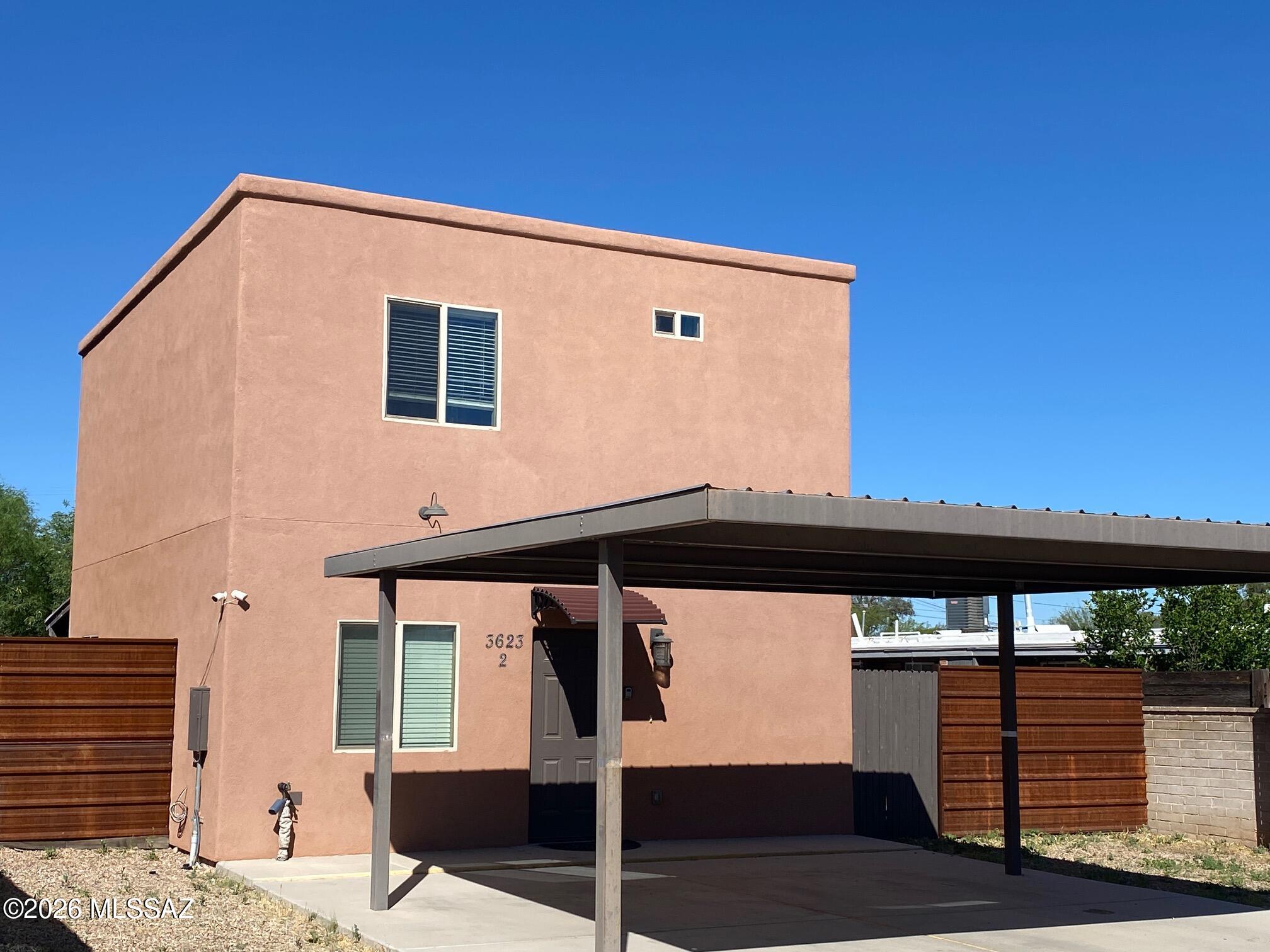 Newer 2 story home with 2 bedrooms and 2 and 1/2 baths. Great Central Location! Home is located just off of Bellevue, offering privacy. Scored concrete flooring downstair and carpeting upstairs. Covered rear porch, metal fenced low care yard and a 2 car carport.