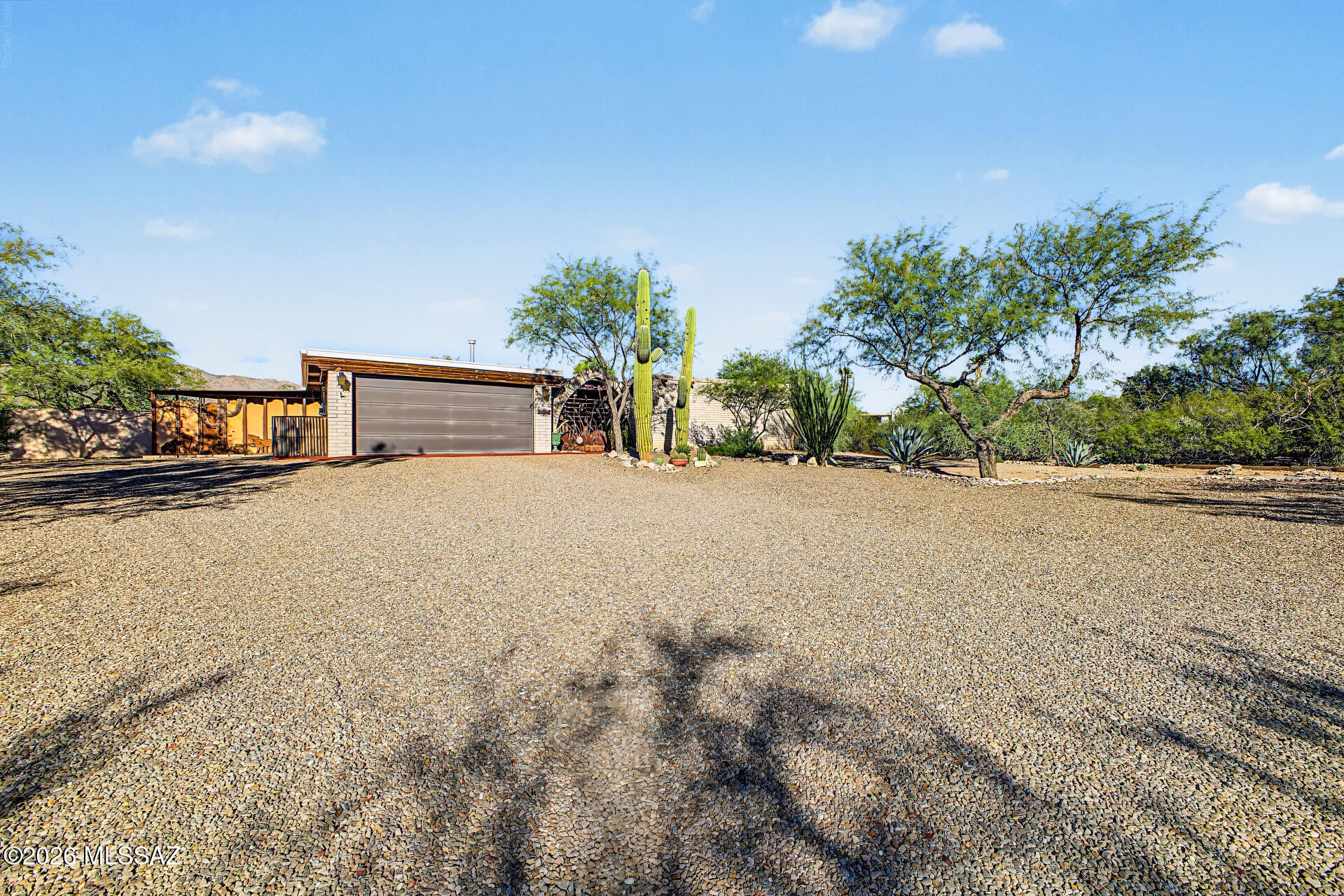 N.E. Gem on over 3/4 acre lot with pool and hot tub, workshop, garden area, shed, AZ room and solar!  This 3 bed / 2 bath classic solid block home comes with a beautiful dining room and Mexican tile just off the foyer. Cozy den with fireplace as well as a family room and HUGE AZ / Bonus room.  Outdoor living is what this home is for with a garden area to the east, horseshoe pit,open space and mountain views to the north and 10x20 shed and patios to the west!  Oh and don't forget this is HORSE PROPERTY... you can have 1.5 horses!! The location is wonderful just a few streets north and west of Catalina Hwy and Tanque Verde so close to shopping and being able to pop in town but that far out feel and space to do what you want!  Don't miss this great home!