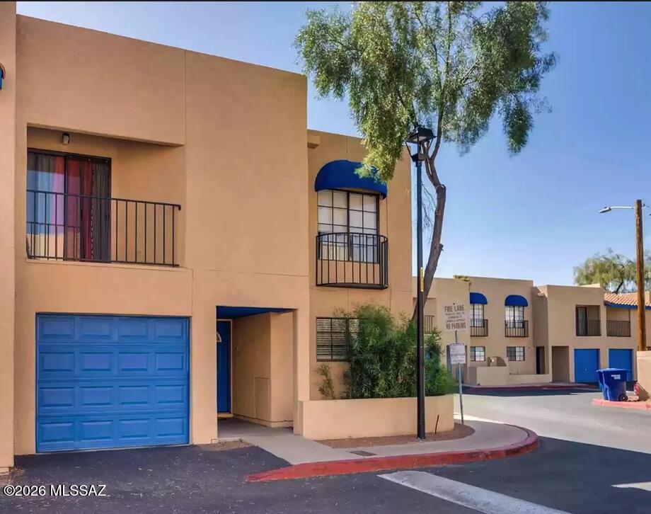 This charming 2-bedroom, 3-bath townhome is currently being upgraded with brand-new grey concrete-style flooring throughout the downstairs and a refreshed primary bathroom giving the home a clean, modern feel. (Photos shown reflect the style of flooring being installed.)

Trash service is included in rent! 

What truly sets this home apart is its rare private gated access directly from your backyard to the community pool and spa a unique feature you won't find in most units.

Step inside to a bright, open great room filled with natural light, highlighted by soaring vaulted ceilings and three large sliding glass doors that create a seamless indoor-outdoor flow. The layout includes a separate dining area, a functional kitchen, and a convenient guest half-bath downstairs.