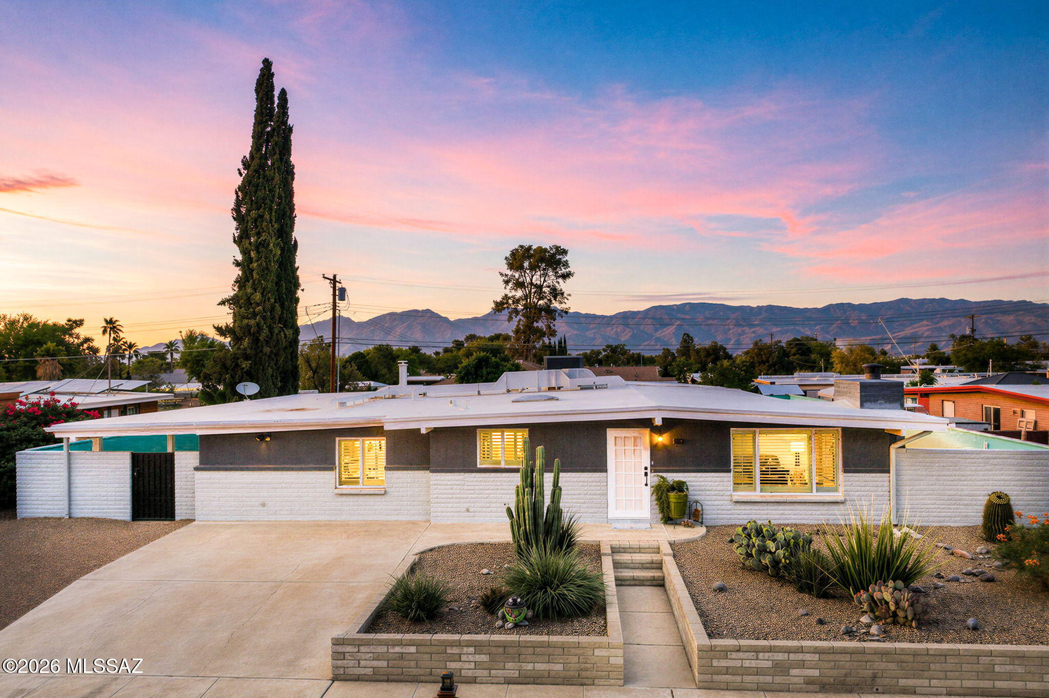 Range Priced-Seller will accept/or counter offers b/w $365,000 & $410,000. This contemporary classic block-built home blends timeless durability with fresh, modern design across 2,355 sq ft of updated living space. A spacious Great Room & Separate Family Room offer flexible gathering areas, while a Bonus Room with Private Entry creates an ideal home office or guest setup. The beautifully Upgraded Kitchen features sleek cabinetry, SS appliances, designer finishes & plenty of cabinet & counter space. Primary Bedroom is a standout in luxury, offering a huge custom walk-in closet plus multiple sitting areas & remodeled bathroom. Outside, a sparkling pool delivers classic Tucson outdoor living perfect for relaxing or entertaining. VA Assumption for VA Buyer only! Assumable rate is only 2.625%.