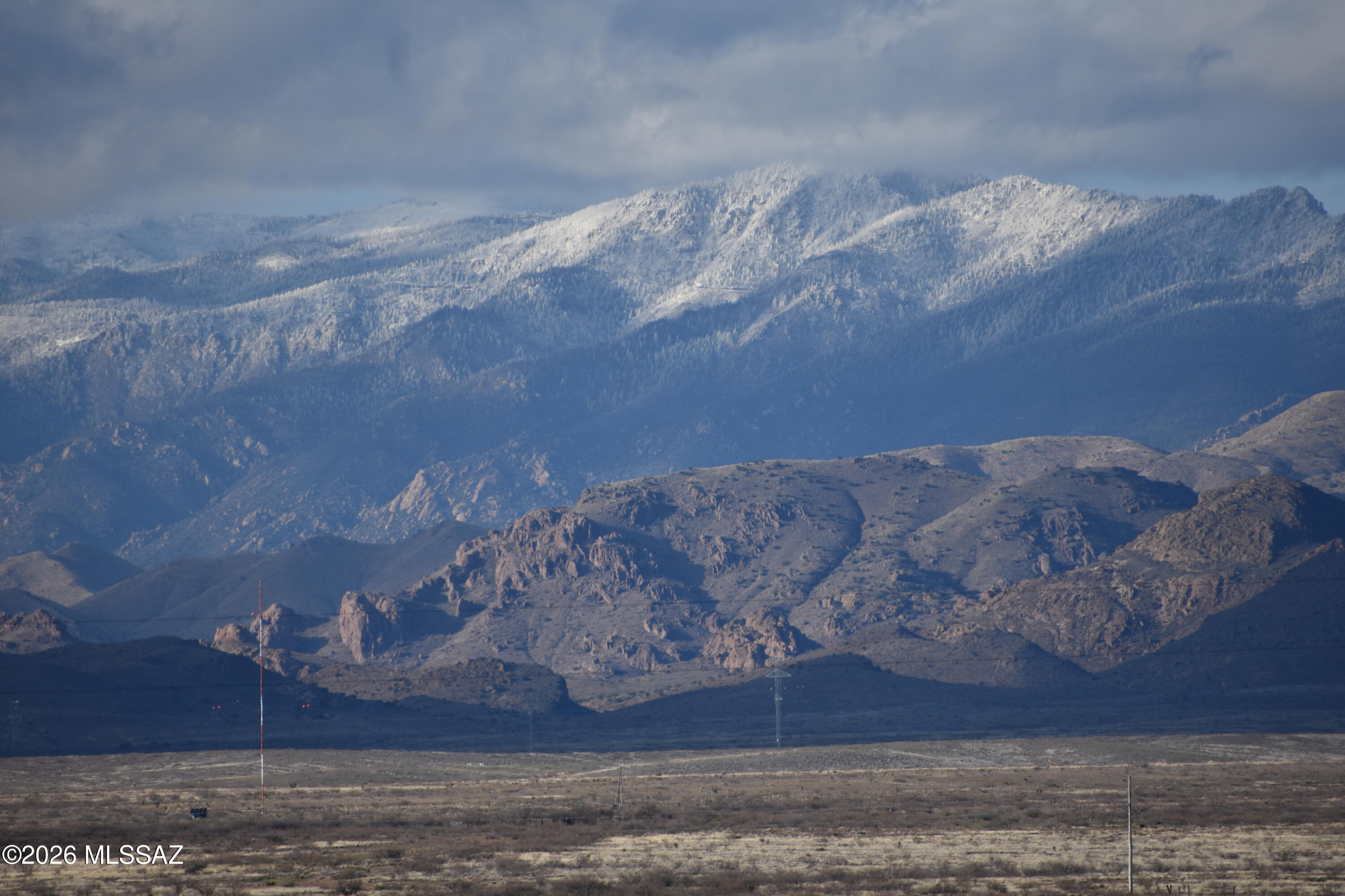 Discover 40 pristine acres in the heart of Willcox, where wide-open skies meet panoramic mountain views and limitless opportunity. This expansive parcel of raw land offers the rare combination of privacy, accessibility, and versatility -- making it an exceptional canvas for a ranch, vineyard, custom home community, or long-term investment hold.  Surrounded by breathtaking views of the Chiricahua Mountains and Dos Cabezas Mountains, the property captures Arizona's natural beauty at every angle. Sunrises stretch across open desert plains, while sunsets paint the mountains in dramatic color -- an everyday luxury that never gets old.  Convenient access to I-10 keeps you connected while preserving the peaceful rural setting that defines the Willcox lifestyle. Why this property stands out:
Ideal for a Ranch or Equestrian Estate - Ample acreage for grazing, barns, arenas, and private trails.

Prime Vineyard Potential - Located in one of Arizona's emerging wine regions, with elevation and climate suitable for cultivation.

Development Opportunity - Space to subdivide (subject to county approval) for custom homes with generous lot sizes and unobstructed views.

Off-Grid or Modern Living - Perfect for a sustainable homestead, solar build, or luxury desert retreat.

Investment Upside - Large parcels are increasingly scarce as buyers seek privacy and land ownership in Cochise County.