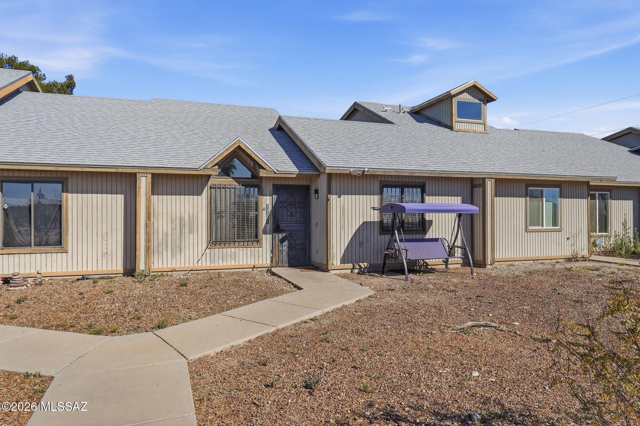 Single-story townhome offering an excellent opportunity for first-time buyers or anyone seeking low-maintenance living in central Tucson. This 2-bedroom, 2-bath home with 1,072 sq ft features vaulted ceilings that create an open and airy feel in the main living area. The functional floorplan provides comfortable living spaces and well-sized bedrooms, making the home feel larger than its footprint. Hard surface flooring throughout means no carpet and easy maintenance. Convenient nearby parking adds everyday practicality. Affordable price point at $210,000 makes this a great alternative to renting. Centrally located with easy access to shopping, dining, schools, parks, and major roadways, making commuting and daily errands simple.