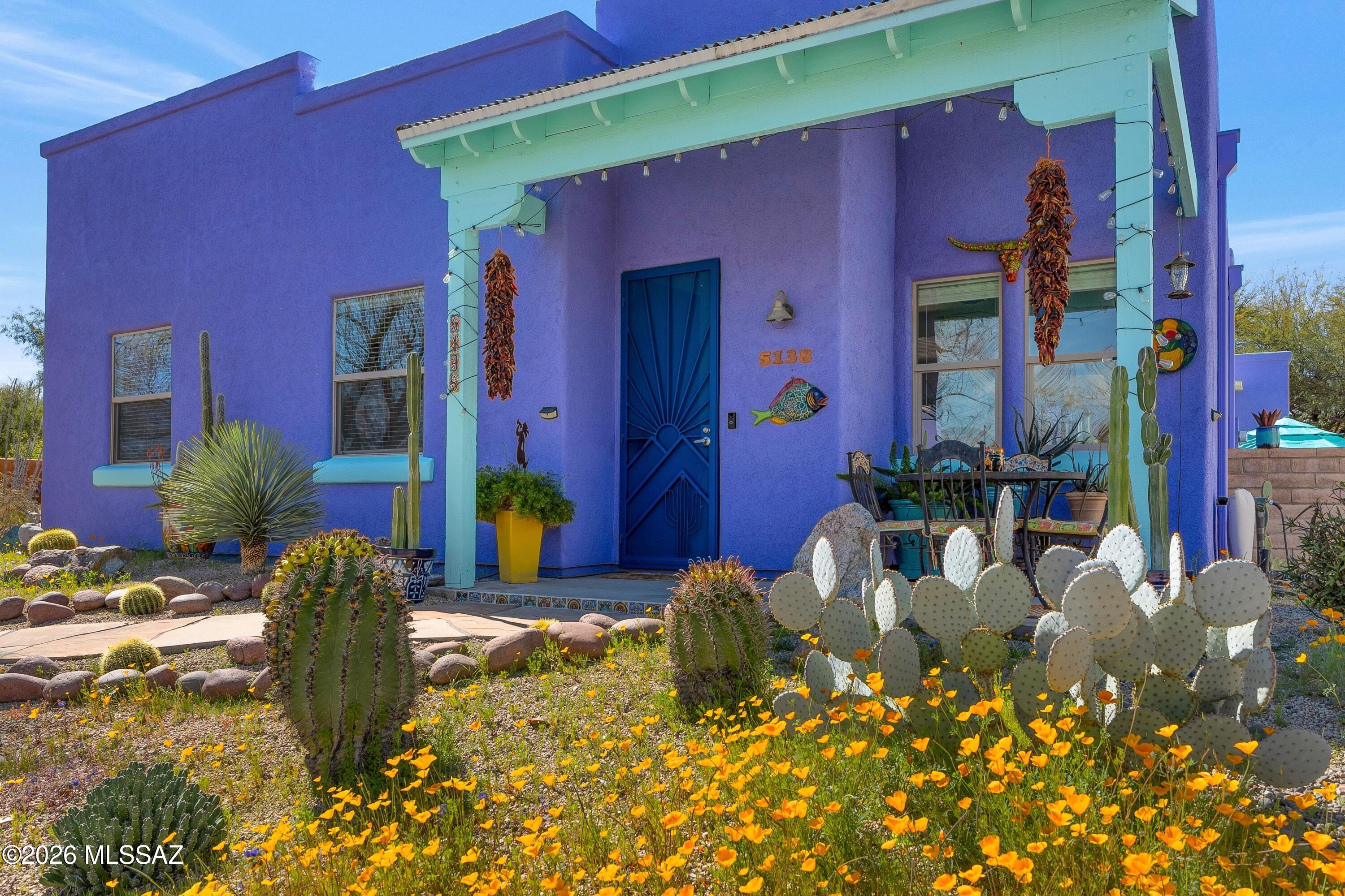 Nestled into the wonderful neighborhood of Civano where people sit on their front porches & talk with neighbors walking by; a neighborhood that is more like a charming small town .
This lovely light filled home has been artfully curated w/ the colors, aesthetics & vibrancy of Mexico & the Southwest. A beautiful place to come home to & to relax on the covered patio overlooking a beautiful desert garden. The spacious great room overlooks a kitchen that would please any chef & dining area w/ stunning wood plank ceilings.  The primary ensuite is large w/ a door opening to the patio & features a big primary closet, dual vanity &   large, luxurious walk-in shower.   
The casita is complete w/ kitchen & bath & the possibilities are endless...extra bedroom, office, artist studio or vacation rent Most recently used as a vacation rental. Furnishings available by separate bill of sale.
Guest house square footage determined by subtracting square footage when Sellers purchased the house from current assessor's records. Please verify if important to you.