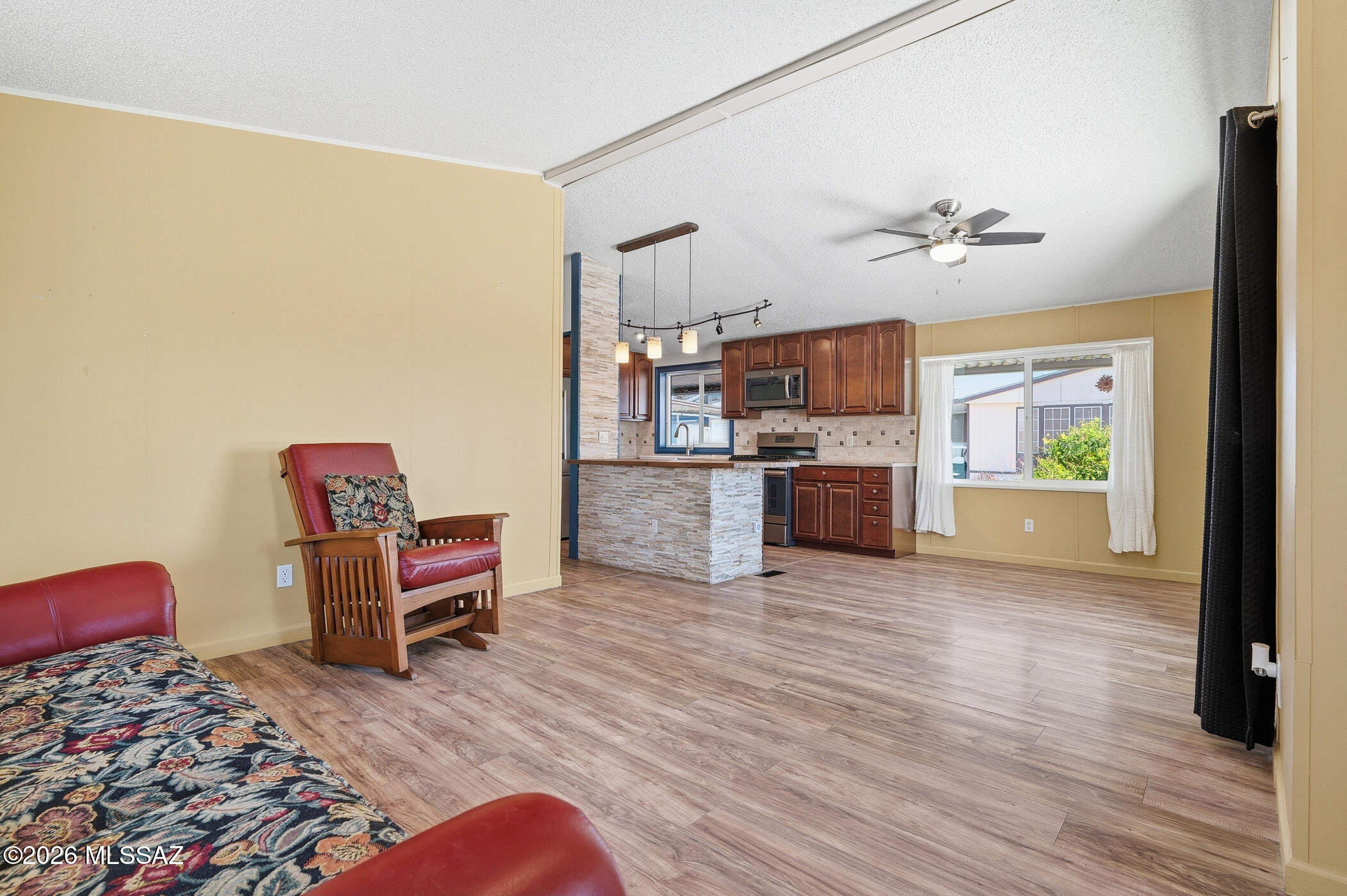Ranged price. Seller to counter or accept offers between $50,000 and $80,000. Seller must sell! Will accept or counter offers within range and make a decision on October 15th. Great home on a corner lot in the 55+ Trails West community that offers 2 pools/spa and a great Rec Center. See docs tab for more info! This manufactured home has some important unique and desired properties: 2 car carport where most have only 1 extended; New roof as of 2025!; New screens on AZ room; New front porch as of 2025; Both bathrooms have been updated over the last two years; New Washer and Dryer; and 2 sheds on each side of the home! Butcher block island in kitchen with Corian counters and attractive backsplash. Windows were updated over the last couple of years as well.
