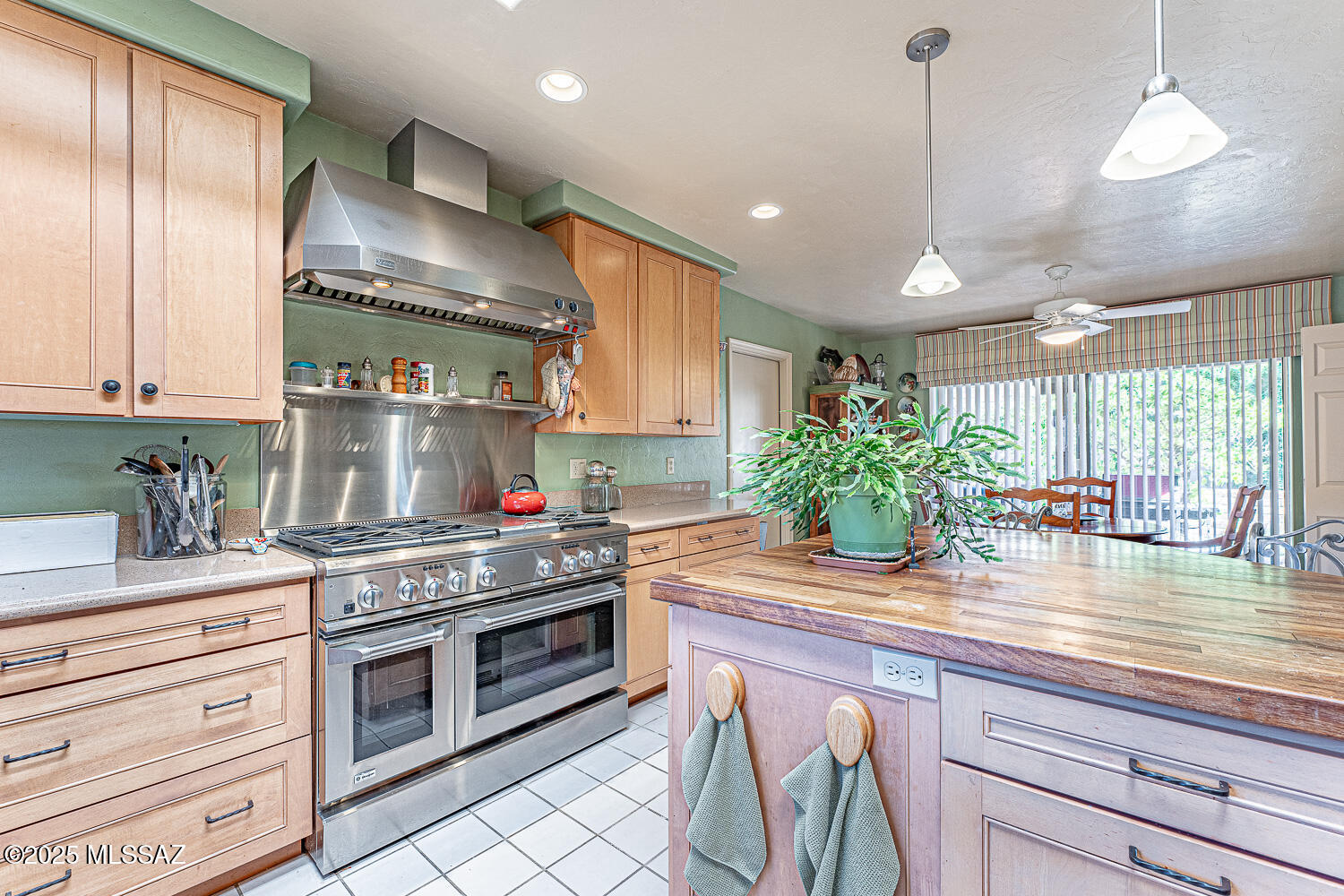 Yes, the house needs work, but now is the time to give this great home new life!  Super neighborhood - fix it for yourself or make it a dream and resell. Generous sized rooms and a chef's dream kitchen with a GE Monogram 6 burner gas stove and range hood and an breakfast bar island with a hardwood top , wine refrigerator and additional storage.  The home features two full baths, both with separate shower and soaking tub.  The owner's suite is generously sized entered into through double doors, a large walk in closet and spa like bath; sliding glass doors leads out to the back patio.  lots of natural light with vaulted ceilings with celestory window in both the great room and owner's suite. Views off the back and overlooks the golf course.  Roof replaced in 2004, new water softener