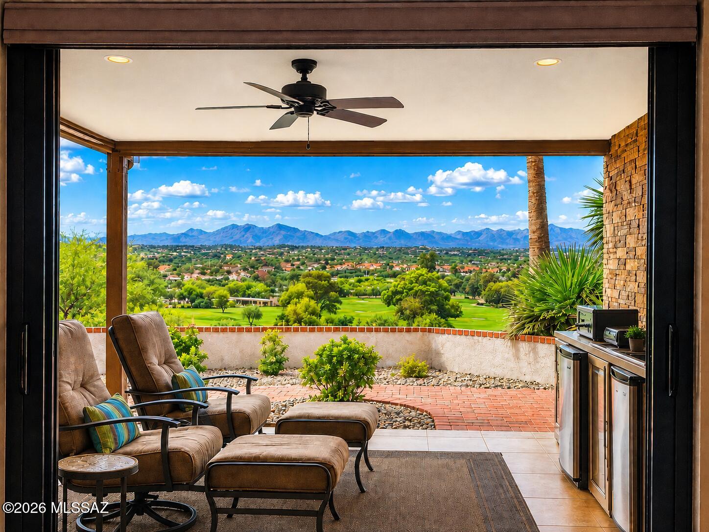 VIEWS!! Walk in and be WOWed by this beautifully updated home with spectacular panoramic views perched high overlooking holes 1 and 9 of OV Country Club, the clubhouse and Tortolita mountain ranges beyond. Set on more than 1-acre, NO HOA & a 220 SF workshop, the property offers an exceptional combination of privacy, scenery and indoor-outdoor living. Extensive pavers enhance both the driveway and backyard, while a generous turf area adds a lush splash of green to the desert setting. Multiple covered patios create inviting spaces to relax and entertain, complemented by a built-in BBQ, outdoor living area, and hot tub beneath its own pergola. Inside, the remodeled kitchen features rich wood cabinetry, striking granite countertops, stainless appliances & Beautifully updated baths. Click more. A rare bonus is the approximately 220 sq ft air-conditioned workshop, ideal for hobbies, studio space, storage or projects. A truly special Oro Valley setting where the views take center stage.