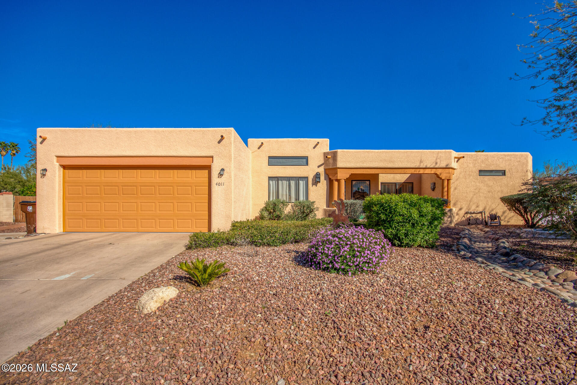 Discover this adorable 3-bedroom home! Nestled in a quiet cul-de-sac with beautiful mountain views, featuring a manicured landscape & a 2-car garage. Explore the inviting living areas, boasting tile floors, soaring vaulted ceilings to add an airy feel, arched passageways, a fireplace to ensure cozy winter evenings, tons of natural light & neutral paint. Prepare your favorite dishes in the well-appointed culinary space, complete with ample cabinetry, plenty of counter space. The main bedroom promises a good night's sleep and hosts a walk-in closet, a bathroom with double sinks, and direct outdoor access. Out back, you'll have ample space for entertainment, showcasing a covered patio and a storage shed for convenience. Beautiful murals painted by world renowned Roc (CyFi) Martinez.