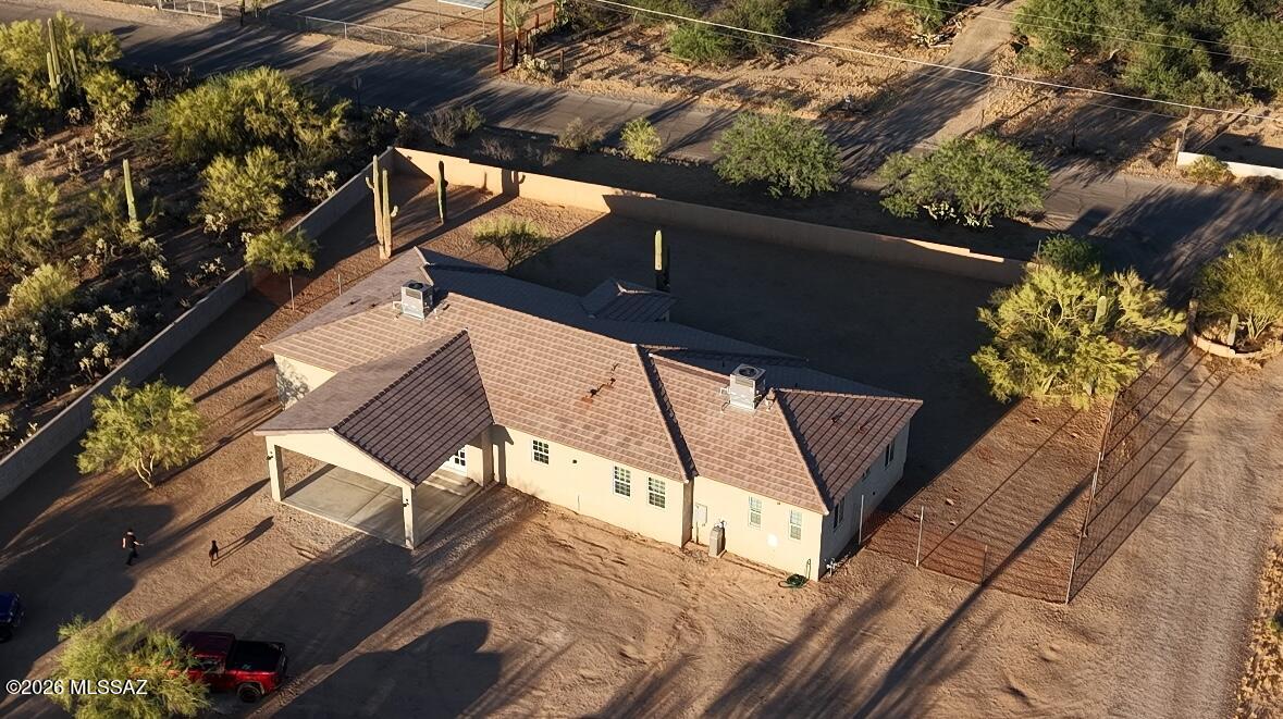 Custom Southwest home set on over an acre with beautiful desert views, privacy, and room to enjoy Arizona living at its best. This 5-bedroom, 3-bath property offers more than 3,000 sq ft of living space, featuring a split floor plan, custom cedar doors, high-quality doors throughout the home, upgraded kitchen cabinets, 10-foot ceilings, an open floor plan, and energy-efficient construction. Designed for comfort and functionality, this home offers the perfect setting for entertaining, relaxing, and taking in the peaceful surrounding landscape. A rare Tucson opportunity with space, style, and timeless desert character.