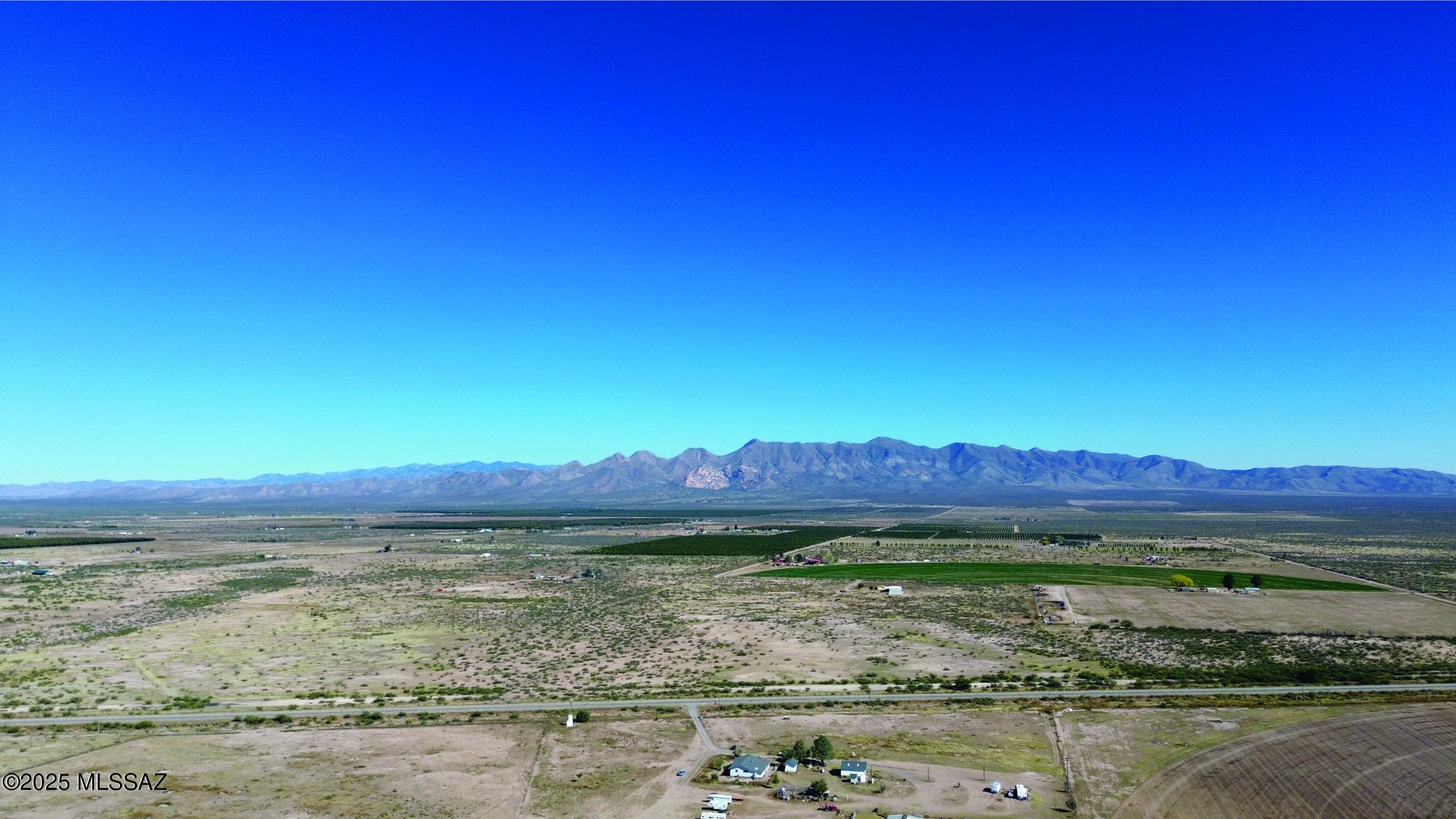 Incredible 17.64-acre property ready for you to build your dream home on. Set right on paved county maintained Central Hwy just south of Elfrida AZ. Unobstructed views, level property. There is a recorded easement for access see survey in the photos. Short drive to Historic Tombstone, Bisbee or all of the Cochise County sites. Electric power is available at the road.  Seller financing is available with $4900 Down plus Pioneer Title account setup and closing Costs, for 7 years at 9.9 percent interest. with a payment of $248.24 per month plus Pioneer Title Processing fee and impounded property tax.