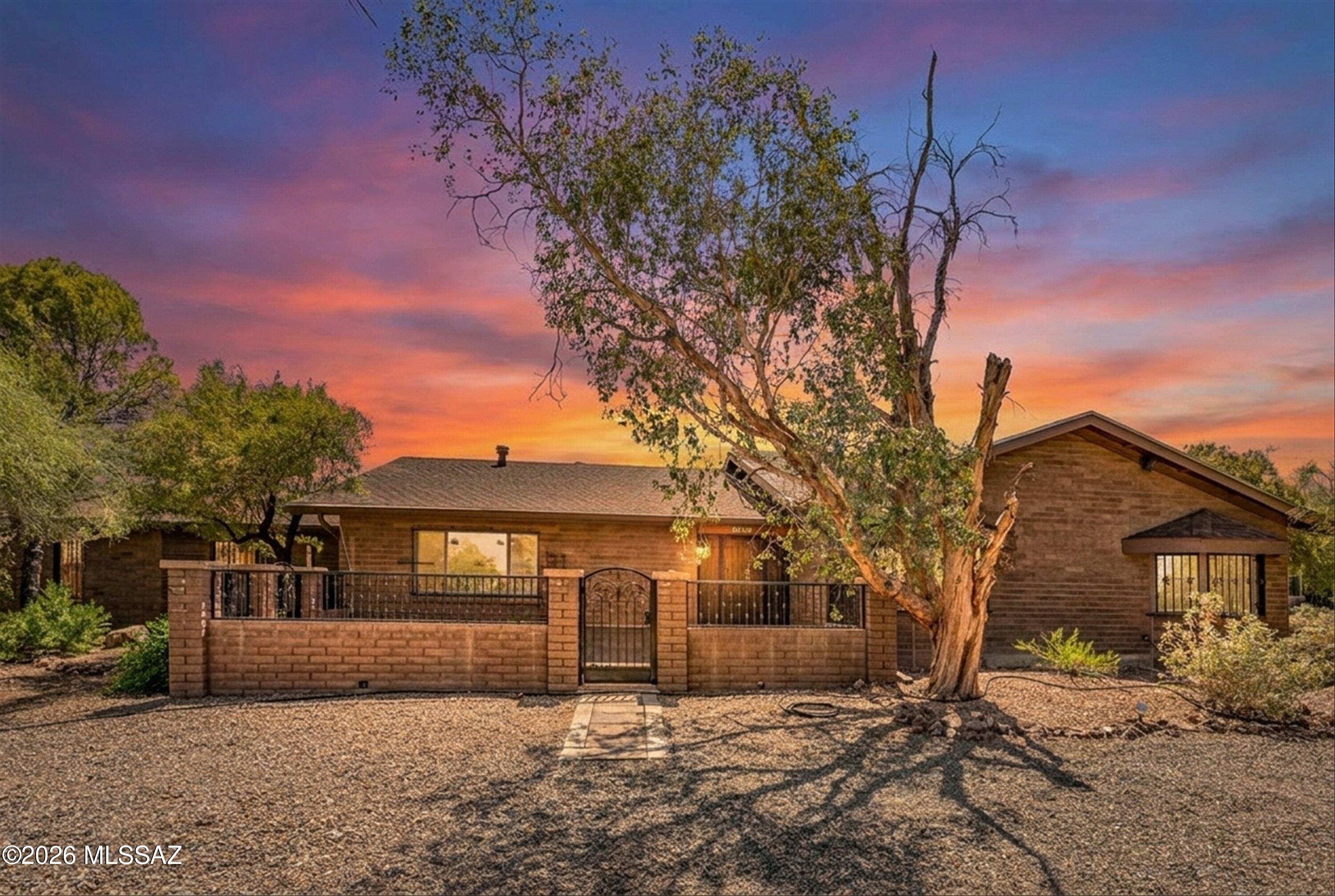 Set on a spacious 1.03-acre corner lot with sweeping mountain views, this beautifully appointed ranch-style home offers the perfect blend of comfort, functionality, and outdoor living.
Step inside to find a thoughtfully designed layout featuring 3 bedrooms and 2.5 baths, along with both formal living and dining rooms--ideal for entertaining or quiet gatherings. The heart of the home is the inviting great room with a cozy fireplace, complemented by an additional family room and a large bonus living space that can easily serve as a game room or media room.
The kitchen is well-equipped with granite countertops, stainless steel appliances, and a walk-in pantry, offering both style and practicality. The primary suite provides a private retreat, complete with a custom walk-in shower, while.... guest bathroom showcases a unique custom tile shower featuring a stunning local mountain scene.
Creative and flexible living spaces abound, including a dedicated craft room perfect for hobbies or a home office. Recent upgrades such as new windows throughout and elegant French doors enhance both energy efficiency and natural light.
Outside, the expansive backyard is designed for enjoyment and relaxation, featuring a sparkling swimming pool, built-in BBQ, and a beautiful fountain with a custom tiled underwater scene. The property also includes a 1,500-gallon rainwater harvesting system, adding a sustainable touch to this already impressive home.
Additional highlights include a 2-car garage with built-in cabinets for ample storage. With its generous lot size, versatile living spaces, and scenic surroundings, this property offers a rare opportunity to enjoy both privacy and convenience in a truly exceptional setting.