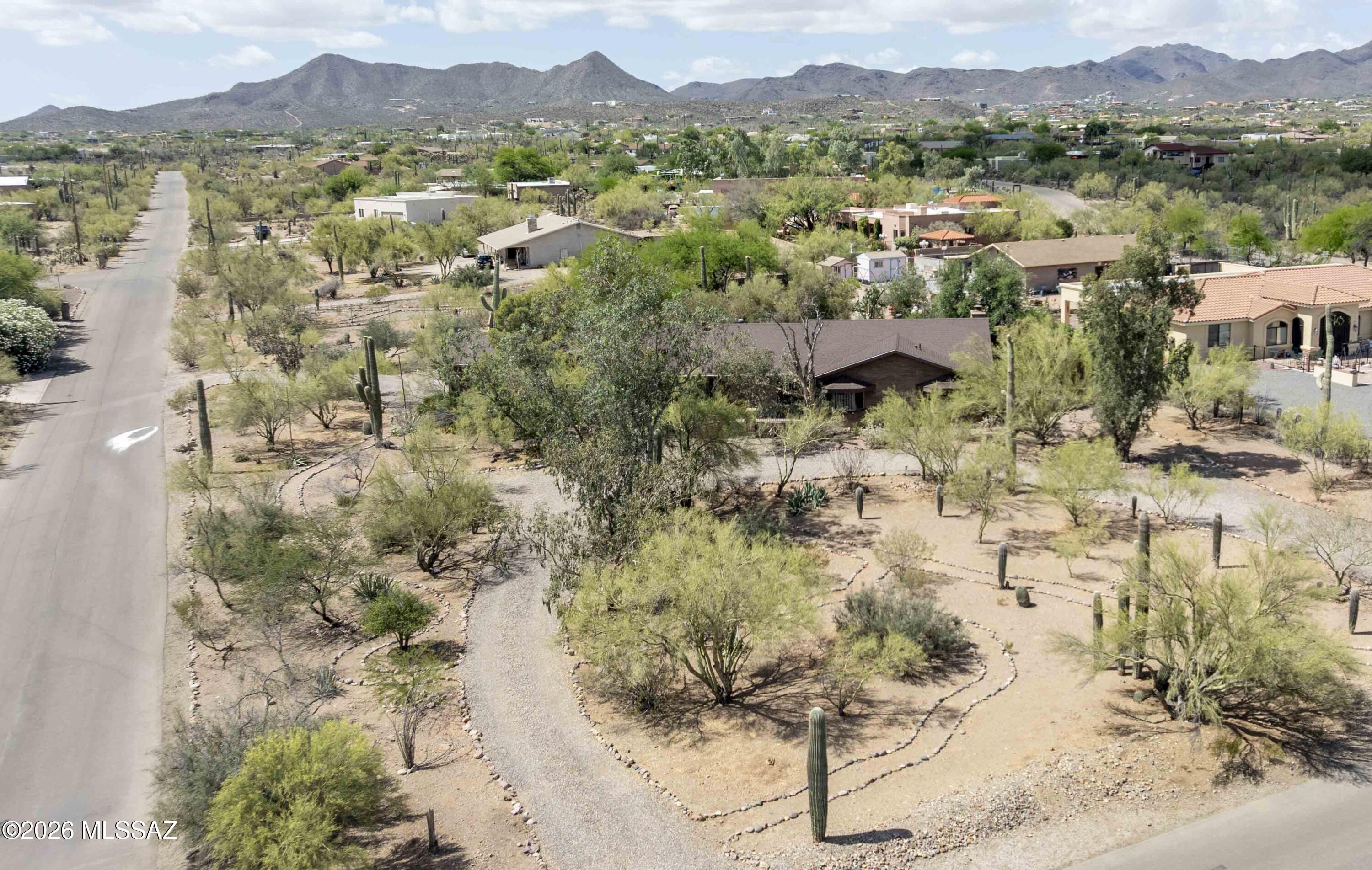 Set on a spacious 1.03-acre corner lot with sweeping mountain views, this beautifully appointed ranch-style home offers the perfect blend of comfort, functionality, and outdoor living.
Step inside to find a thoughtfully designed layout featuring 3 bedrooms and 2.5 baths, along with both formal living and dining rooms--ideal for entertaining or quiet gatherings. The heart of the home is the inviting great room with a cozy fireplace, complemented by an additional family room and a large bonus living space that can easily serve as a game room or media room.
The kitchen is well-equipped with granite countertops, stainless steel appliances, and a walk-in pantry, offering both style and practicality. The primary suite provides a private retreat, complete with a custom walk-in shower, while.... guest bathroom showcases a unique custom tile shower featuring a stunning local mountain scene.
Creative and flexible living spaces abound, including a dedicated craft room perfect for hobbies or a home office. Recent upgrades such as new windows throughout and elegant French doors enhance both energy efficiency and natural light.
Outside, the expansive backyard is designed for enjoyment and relaxation, featuring a sparkling swimming pool, built-in BBQ, and a beautiful fountain with a custom tiled underwater scene. The property also includes a 1,500-gallon rainwater harvesting system, adding a sustainable touch to this already impressive home.
Additional highlights include a 2-car garage with built-in cabinets for ample storage. With its generous lot size, versatile living spaces, and scenic surroundings, this property offers a rare opportunity to enjoy both privacy and convenience in a truly exceptional setting.