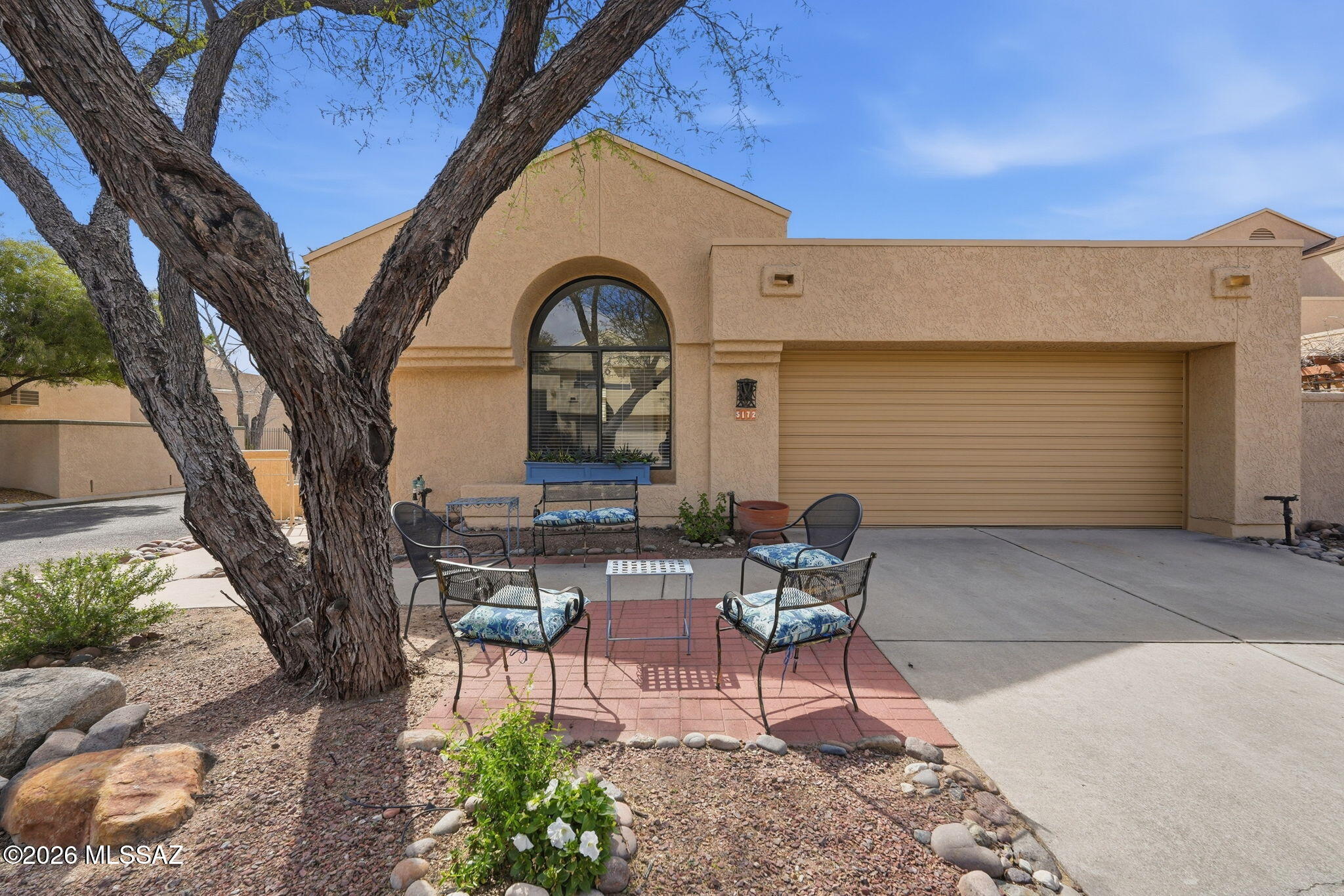 Art, beauty and an open spacious floor plan combined with well appointed   outdoor patio spaces provide an inspiring atmosphere for the best of Tucson living. Lovingly cared for with newly painted exterior and interior garage, this 3 bedroom 2 bath home sits on a corner lot for extra privacy.  High ceilings, a fireplace, flexible interior spaces, stainless steel appliances, a 2 car garage with extra storage cabinets and gorgeous outdoor spaces for relaxing make this an ideal home.

Bosque Creek in Tucsons Historic Old Fort Lowell district is a coveted and iconic neighborhood combines the history of Old Ft. Lowell, San Pedro Chapel and nature including mountain views, an HOA managed  13 acre nature preserve with walking trails and access to the Tucson Loop Bike Path. The community pool with changing area, shower, bathroom and bar-b-que is located in the nature preserve for privacy, beauty and wonderful mountain views.  Swim and picnic on the tables in the community pool area. Walk or bike the Loop/Riverwalk which is just beyond the nature preserve.  Truly a special area!
