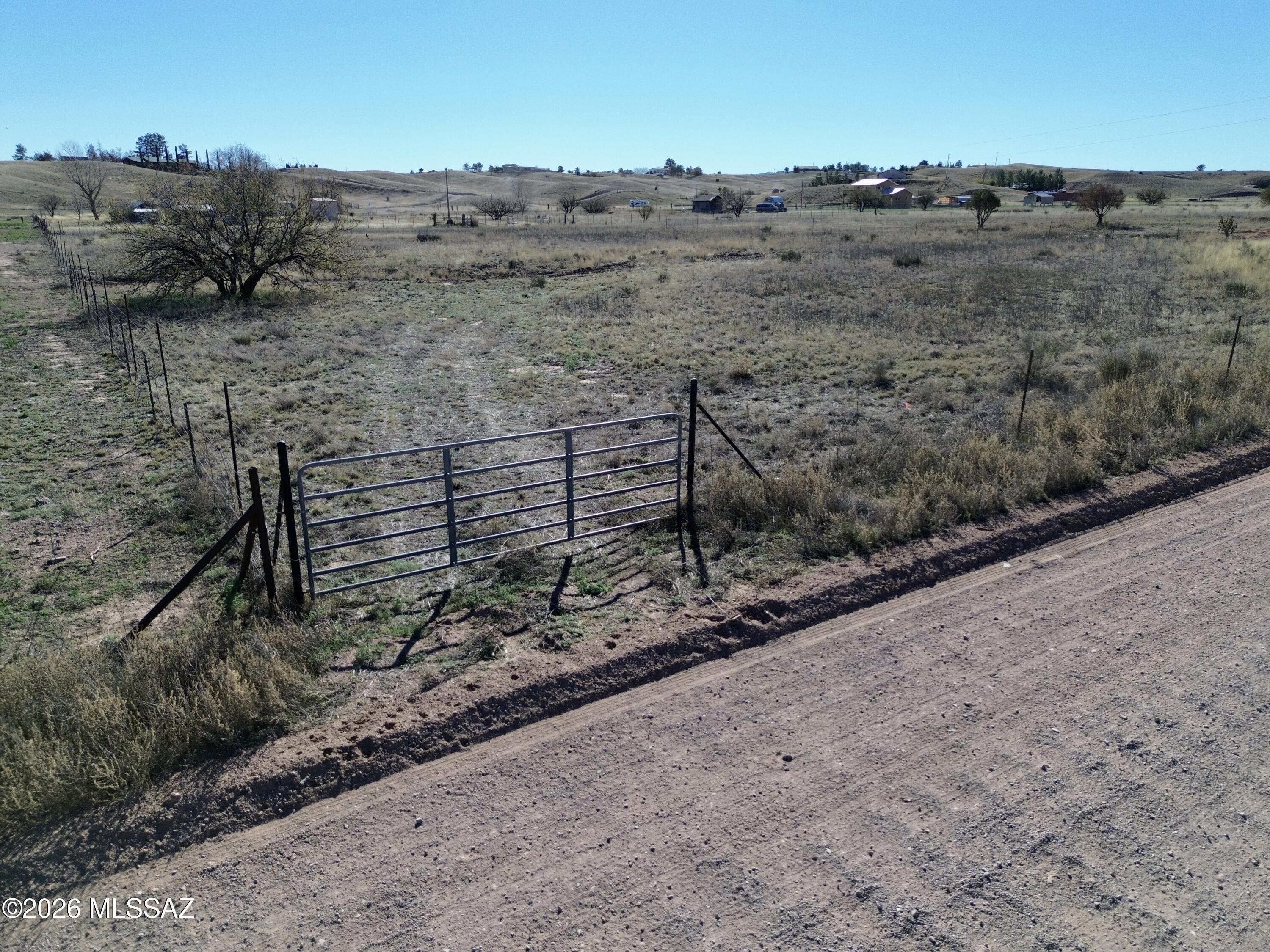 Build your dream home on this 1.84-acre Sonoita lot! Zoned SR for spacious suburban ranch living. Save time & money: TOPO survey & perk test are DONE. Well & pump estimates are ready for you. This property is nearly shovel-ready--just needs a base elevation cert for county approval. Imagine your custom home with breathtaking views in the heart of Arizona's wine country. Your private retreat at 23 Harvest Dr awaits. Don't miss out!