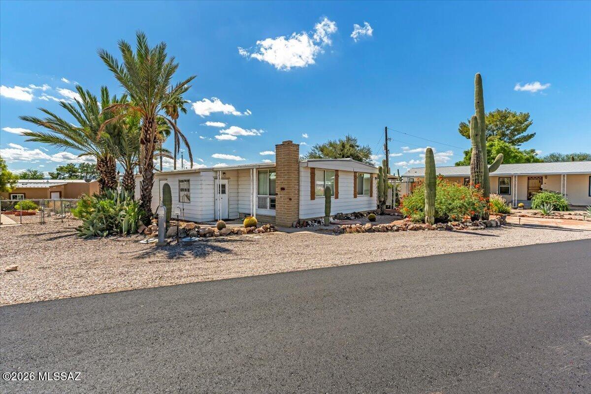 Upgraded 3-bedroom furnished property offering mountain views right from the front window.  Inside, the kitchen is equipped with granite countertops and wood cabinetry, perfect for daily cooking and entertaining.  Two of the bedrooms feature remodeled ensuite bathrooms, providing comfort, privacy, and convenience for owners and guests.  Additionally, the fully drywalled Arizona Room provides extra living space, making it a great setup for a craft room, studio, or secondary sitting area.  A major highlight of this property is that you own the land outright, with no lot lease required.  Active Adult community.  Amenities covered by the HOA, including golf, swimming pools, spa, Tennis, pickleball courts, Community Center, Activities, and Hiking Trails nearby.