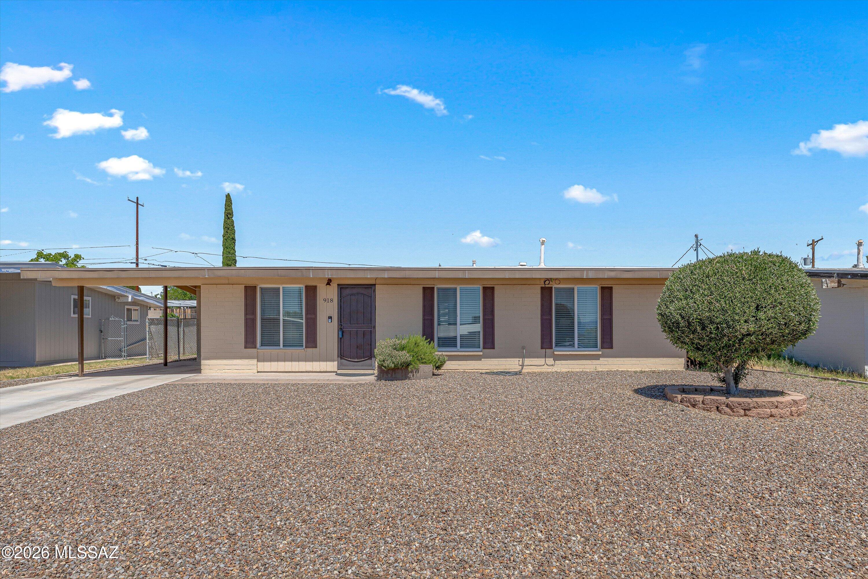 Beautifully updated 3 bedroom, 2 bath home remodeled in 2017! This property features a desirable primary suite with a private ensuite bathroom--an uncommon and convenient layout for San Manuel homes. Some of the upgrades include double pane windows, water heater, vinyl plank flooring, and ceramic tile throughout. Stay comfortable year-round with air conditioning. The fully fenced yard offers added privacy and includes a gate with alley access. A 12' x 16' Tuff Shed with electricity provides excellent space for storage, hobbies, or a workshop. No HOA and access to high-speed fiber internet make this home both practical and connected.