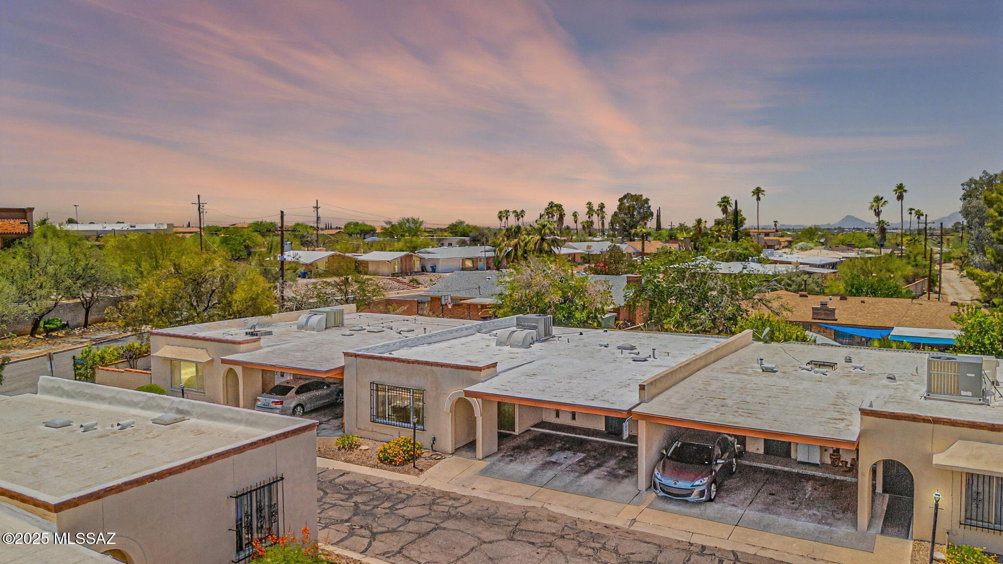 Amazing opportunity for affordable 1,406 SqFt 3 bed/2 full bath updated single story, no stairs/no steps masonry stucco townhome located in East Tucson. Reasonable $65 monthly HOA includes: sparkling gated community pool, pest control, front yard maintenance, street maintenance and clubhouse. Featuring E/W orientation, attached 2 car carport, extra storage room, sold metal window security bars, front metal security door and Ring security camera doorbell. Inside buyers will appreciate textured painted ceilings (no popcorn), upgraded energy efficient double pane windows, custom window blinds, new gas HVAC 2023 (located on roof), digital thermostat, all galvanized plumbing replaced with Pex and new sewer line (plumbing & sewer combined $25K), new Nov 2025 luxury plank flooring, internal laundry room w/washer and dryer included, updated kitchen with real wood kitchen cabinets, stainless steal appliance package including oven w/metal exhaust hood, dishwasher, side by side refrigerator w/ice & water dispenser, garbage disposal, exhaust fan and closet pantry. Spacious bedrooms, full guest bathroom and primary suite with private full ensuite bathroom, energy efficient double pane slider out to covered private backyard patio. Sellers recently had roof recoated with elastomeric coating by Hallmark Roofing in the amount of $1,350 May 2025. Please see multiple documents under the documents tab in MLS. Rentals are allowed making this an excellent second home or investment property for winter visitors and investors alike!
Convenient East Tucson location walking distance to Old Spanish Trail School, shopping, restaurants, groceries including Frye's and Super Target. Quick drive to Saguaro National Park, Davis-Monthan Air Force Base and Raytheon, part of RTX Corporation. Call to make your appointment to view this move in ready townhome today!!