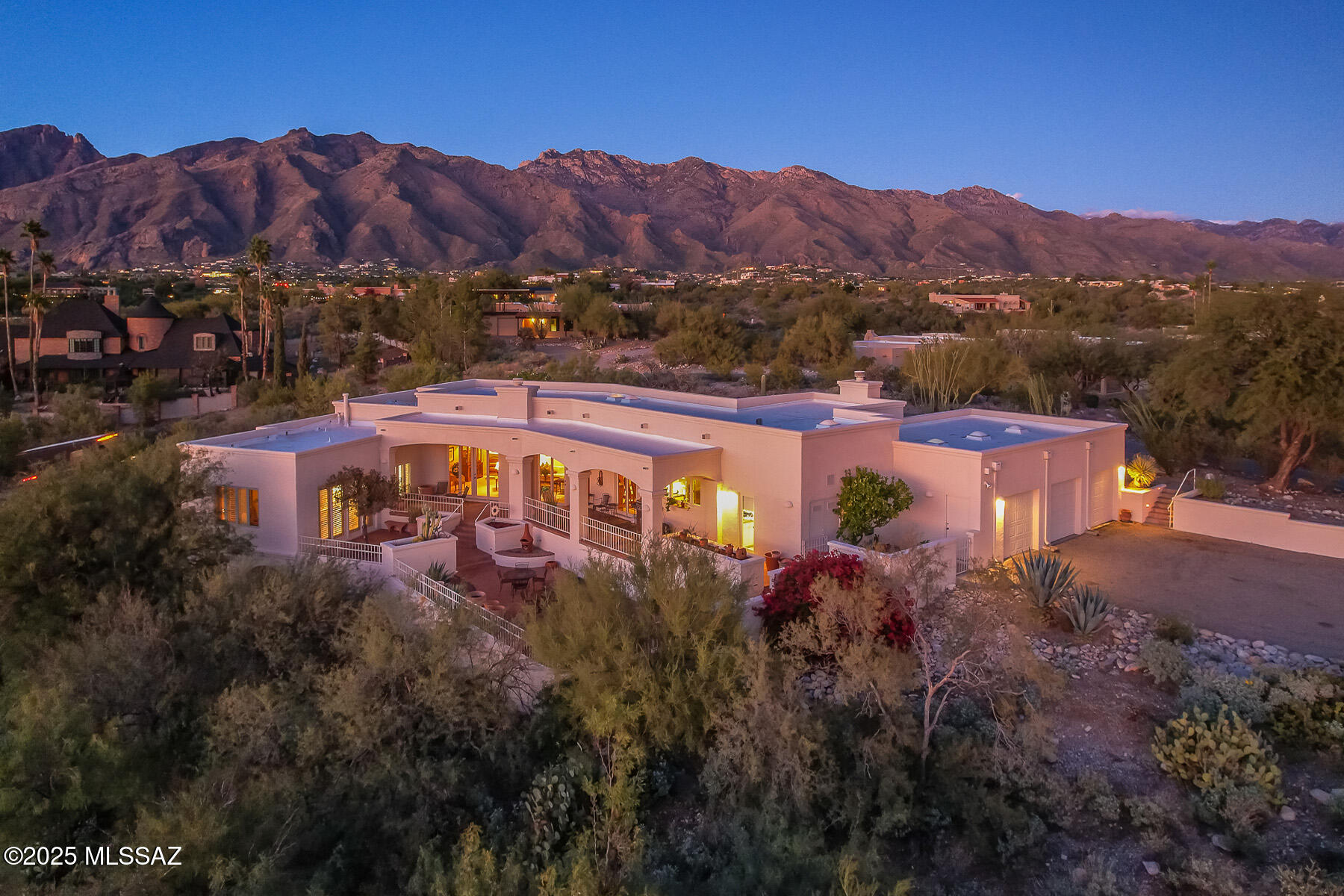 Experience classic Catalina Foothills living in this 3,122 sq ft, original-owner 1990s home offering 3 bedrooms and 3.5 baths. Positioned on an elevated lot, it showcases panoramic views of Tucson's city lights and surrounding mountains from nearly every room. The spacious, light-filled interior features generous living areas, timeless architectural lines, and a layout designed for both comfort and entertaining. Enjoy  multiple view patios, mature desert landscaping, and unmatched privacy. This well-kept, mostly original residence is ready for your vision-an exceptional opportunity in one of Tucson's most sought-after locations.