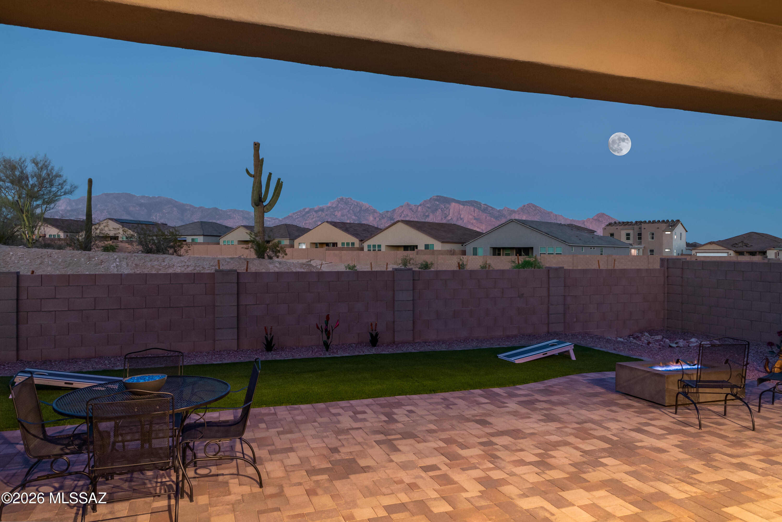 Experience modern Arizona living in this nearly new Mattamy-built Blush model located in the sought-after Montelena
community. Offering 2,471SF of thoughtfully designed living space, this one-year-old home features an open great room concept perfect for both everyday living & entertaining. The spacious floor plan includes 3BR, 2.5BA + versatile study/office ideal for working from home or creating a private retreat. The beautifully appointed kitchen features 42'' cabinets, quartz counters & large center island and flows seamlessly into the expansive great room & dining area, creating a bright & welcoming atmosphere. Step outside to enjoy the covered patio with desirable east-facing Catalina Mountain views -- the perfect setting for relaxing mornings and shaded afternoon entertaining. The professionally finished backyard showcases low-maintenance artificial turf, firepit and attractive brick pavers for easy outdoor living year-round. Additional highlights include a 3-car garage with epoxy flooring & mini-split, laundry room with utility sink,
contemporary finishes & the peace of mind that comes with owning a nearly new home. Combining comfort, style & scenic desert beauty, this exceptional Montelena residence is ready to impress.