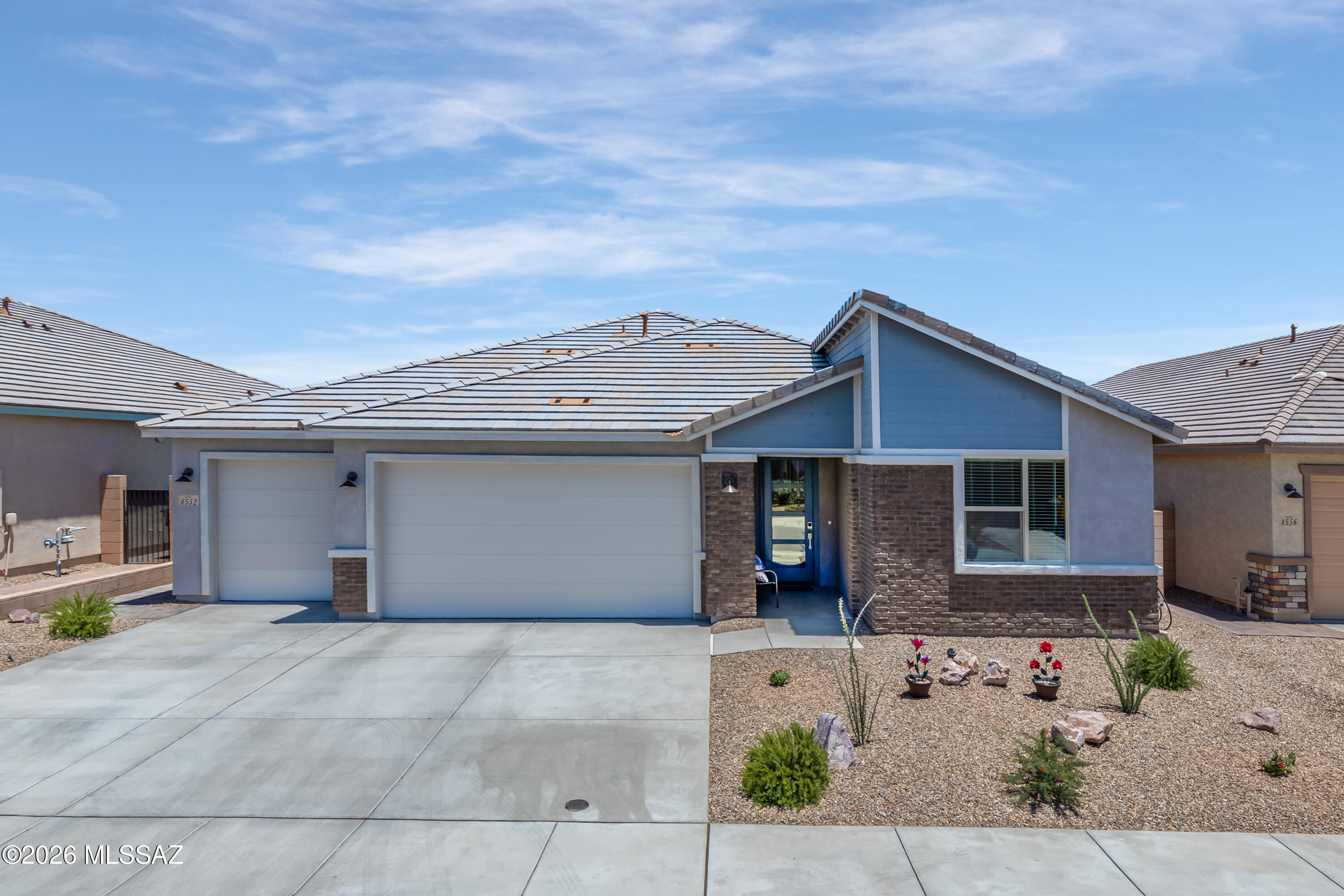 Experience modern Arizona living in this nearly new Mattamy-built Blush model located in the sought-after Montelena
community. Offering 2,471SF of thoughtfully designed living space, this one-year-old home features an open great room concept perfect for both everyday living & entertaining. The spacious floor plan includes 3BR, 2.5BA + versatile study/office ideal for working from home or creating a private retreat. The beautifully appointed kitchen features 42'' cabinets, quartz counters & large center island and flows seamlessly into the expansive great room & dining area, creating a bright & welcoming atmosphere. Step outside to enjoy the covered patio with desirable east-facing Catalina Mountain views -- the perfect setting for relaxing mornings and shaded afternoon entertaining. The professionally finished backyard showcases low-maintenance artificial turf, firepit and attractive brick pavers for easy outdoor living year-round. Additional highlights include a 3-car garage with epoxy flooring & mini-split, laundry room with utility sink,
contemporary finishes & the peace of mind that comes with owning a nearly new home. Combining comfort, style & scenic desert beauty, this exceptional Montelena residence is ready to impress.