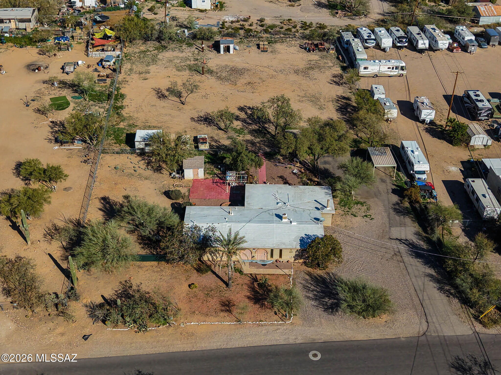 Own your slice of the Southwest with 1.18 acres perfect for buyers craving space, flexibility, and those wide-open mountain views. With room to spread out, this property shines for horse enthusiasts looking to create an arena, corrals, tack/storage areas, and a true ranch-style setup, while still enjoying the convenience of Tucson living.
Need elbow room for your toys, trailers, or equipment? The generous lot size offers incredible potential for RV/boat parking, a workshop, and storage options (buyer to verify intended use with Pima County). Larger lot offers flexibility that attracts a broad range of buyers—think multi-generational living, creative land use, and the freedom that comes with a large-lot homestead lifestyle. 
Close to I-19 and major shopping