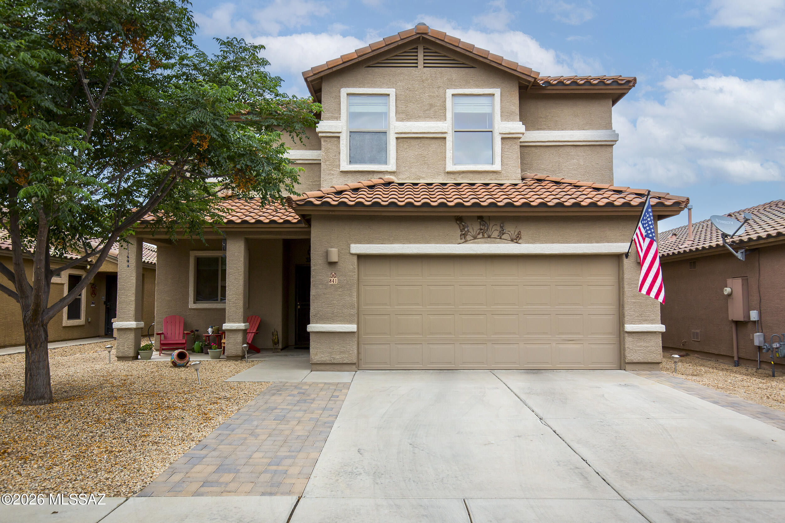 Amazing 5-bedroom, 2.5-bath home, and community where curb appeal meets modern comfort. Inside, an expansive open floor plan is accented by gorgeous wood-like vinyl plank floors, a neutral palette, and a versatile den ideal for a home office/BR. The heart of the home is the elegant kitchen, featuring ample cherry cabinetry, a walk-in pantry, granite countertops, and stainless-steel appliances. The center island with a breakfast bar overlooks the living area, making it perfect for hosting. Retreat to the spacious primary suite, complete with a large walk-in closet and a spa-like bath featuring dual sinks, a soaking tub, and a separate shower. Step outside to your private backyard retreat! Enjoy the covered patio, low-maintenance turf, and an extended seating area with a fire pit--perfect for cozy desert evenings. Residents also enjoy premium HOA amenities, including a sparkling pool, parks, playground, walking paths, and basketball/tennis courts.