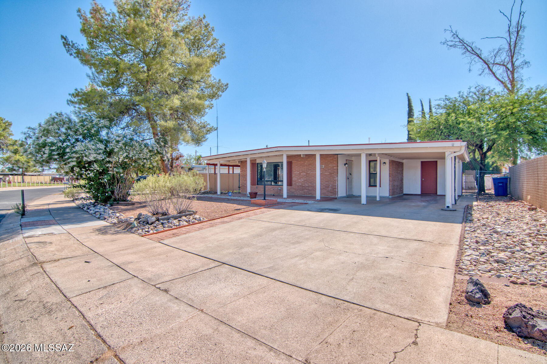 Cute, clean and move in ready! This home has amazing curb appeal and if you love outdoor living spaces this is the house for you. Large front patio and huge side patio perfect for entertaining and hanging with friend and family. Red brick mid-century home has fresh paing and carpet quartz counter tops, updated primary bathroom and a large lot. This home is a great value and right across the street from a cool neighborhood park. Easy commute to DM. Owner/Agent
