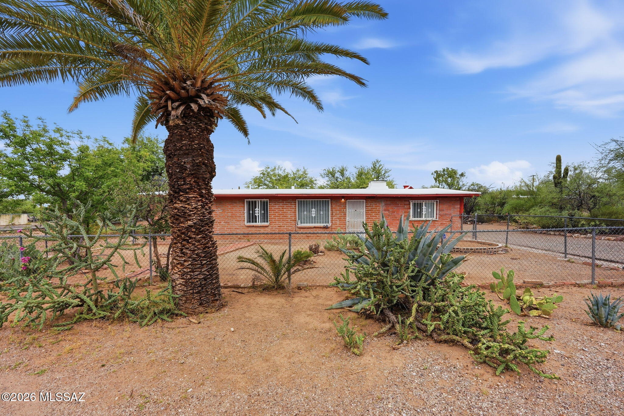 This double corner lot spans about 18,000 square, offering ample space for an ADU, permited for a 1,500 sq ft, 2 story home or a workshop (please see the attached ADU plans). The home features a bright, light-filled interior with concrete flooring throughout, 4 bedrooms, 3 bathrooms, an enclosed covered patio, and a 1-car garage. Additionally, the property is fully fenced and gated, featuring beautifully landscaped grounds. It is truly a must-see!