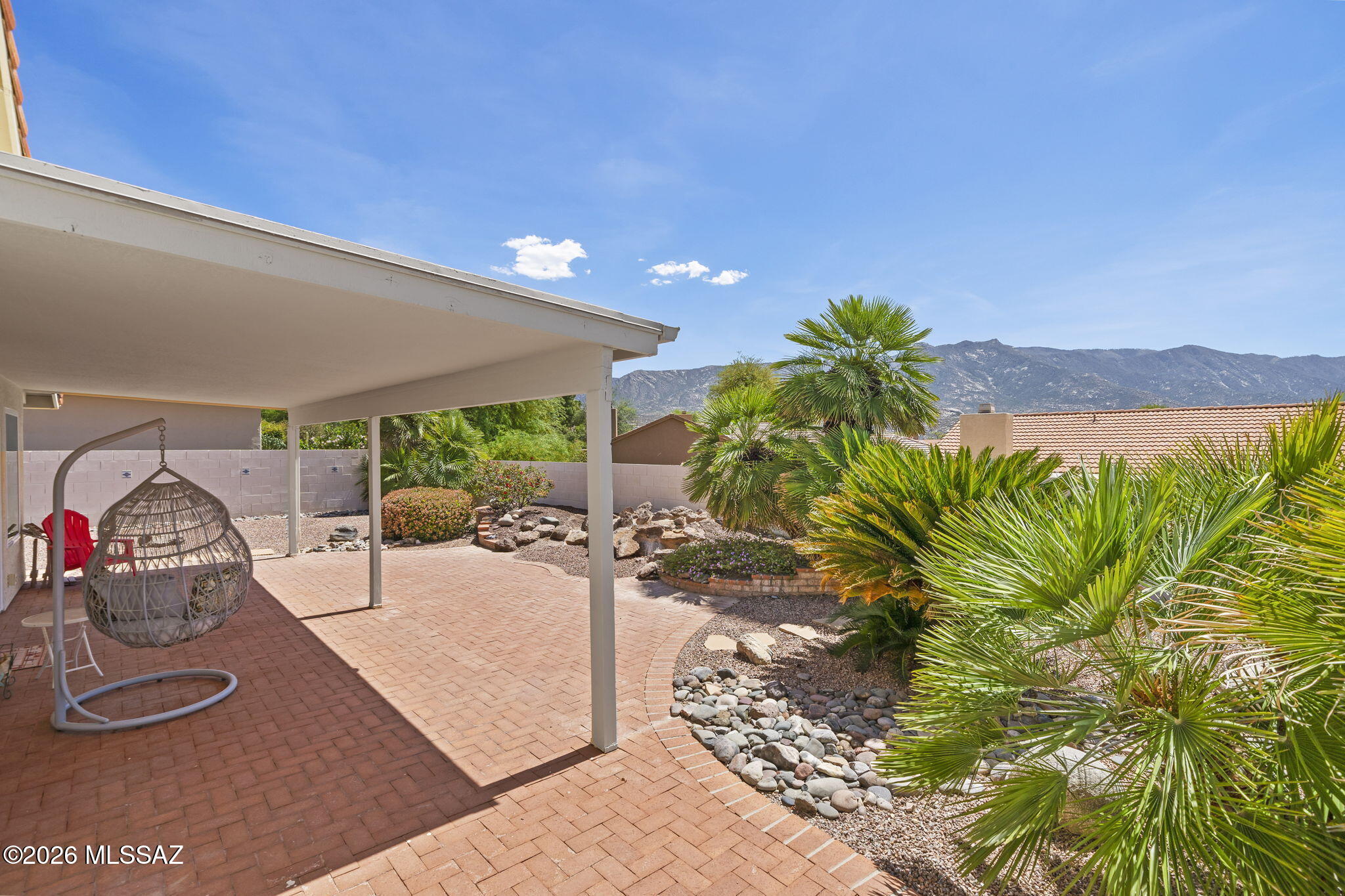 Over $122,000 invested in improvements completed within the past 12 months throughout this extensively remodeled SaddleBrooke home, where near unobstructed mountain views stretch far beyond what photos can capture. Seller is offering a $5,000 carpet allowance with accepted offer. Set on one of the community's most desirable streets--known for its larger lots and thoughtfully enhanced homes--this property offers both exceptional setting and substance. Showcasing 1,883 sqft of single-level living, this 2-bedroom, 2-bath residence has been reimagined from the ground up--taken down to the drywall and concrete to create a truly modern, move-in ready home. Major upgrades have been completed, including a new roof with warranty, new Milgard windows and sliding glass doors throughout entire home, new exterior paint, as well as updated electrical and plumbing systems for long-term peace of mind.  The new flooring combination of all-new high-end wide luxury vinyl plank flooring in traffic areas and kitchen paired with quiet, comfortable brand new designer woven nylon carpeting with memory foam padding in bedrooms and cozy living areas are at once up to the minute in trending and durability.
 
At the heart of the home, a $50K+ kitchen and family room transformation expands the living space and introduces a more open, light-filled layout. The redesigned kitchen features new cabinetry, quartz countertops, stainless steel appliances, and a large island with snack bar--all opening to walls of picture windows and sliding glass doors that frame sweeping, elevated views of the Santa Catalina Mountains.
 
Both bathrooms have been upgraded with new 36" cabinetry, plumbing, sinks, and fixtures, while interior improvements--including wall and ceiling refinishing, fresh paint, removal of dated features, and new baseboards throughout--reflect a consistent level of care and attention to detail.
 
Importantly, this is not a quick cosmetic flip. Every improvement was completed by the current owner with the intention of personal use, resulting in a level of quality, investment, and finish that goes well beyond the typical remodel.