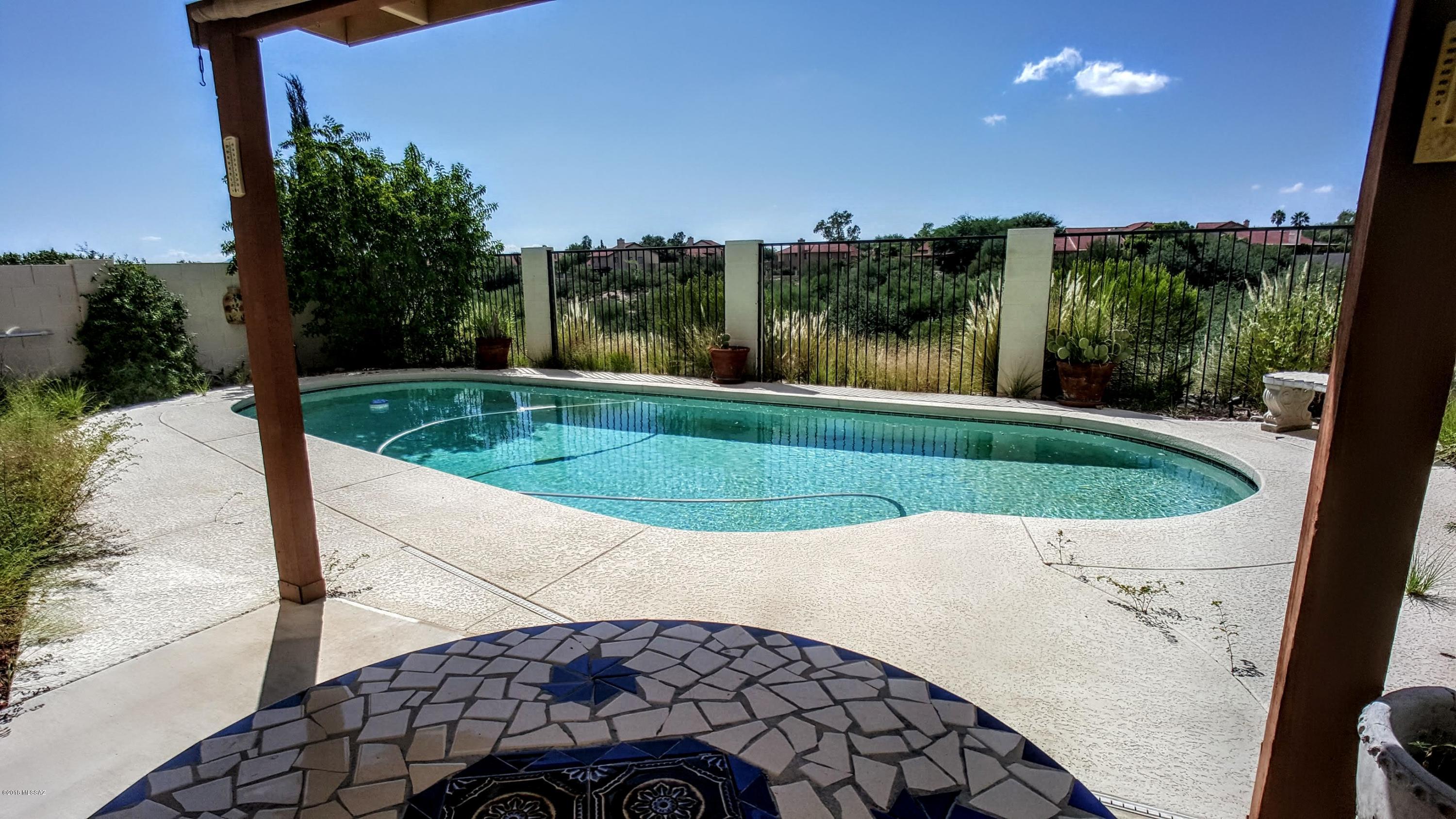 FURNISHED Two-Bedroom, Two-Bath home in Copper Creek community in Oro Valley. VERY PRIVATE Rear Yard with SWIMMING POOL! Comfortably furnished, Fireplace, Great Room, Inside Laundry, One-car garage. WE DO FLEXIBLE LEASES! If you are doing a major REMODEL, BUILDING New Construction, Searching for that Perfect RESALE, or just wanting to Experience the AMAZING SaddleBrooke LIfestyle- give us a call! We will coordinate your lease with YOUR timing needs! Off-season rates shown. Call Listing Broker for your Personal Tour TODAY!