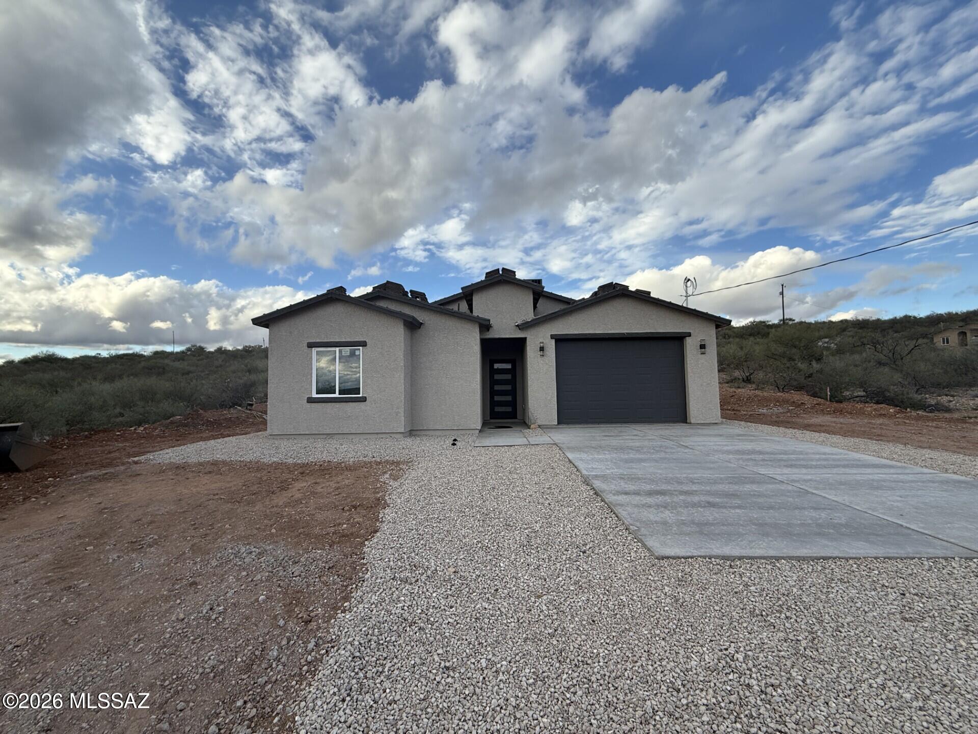 Beautiful New Construction Home in Rio Rico. Welcome to this fully refreshed 3-bedroom, 2-bath single-family home offering  modern comfort and convenience. This property gives you added space, freedom, and unobstructed views and with no HOA!
Inside, the home features brand-new tile flooring throughout, creating a clean and cohesive feel. The kitchen stands out with stainless steel appliances, granite countertops, abundant counter space, a spacious island, ample cabinetry, and a walk-in pantry—perfect for cooking, entertaining, and everyday living.
Wake up to stunning mountain views and enjoy peaceful surroundings while still being just 5 minutes from the freeway, offering quick access to shopping, dining, and local amenities! Act now and don't miss this opportunity!