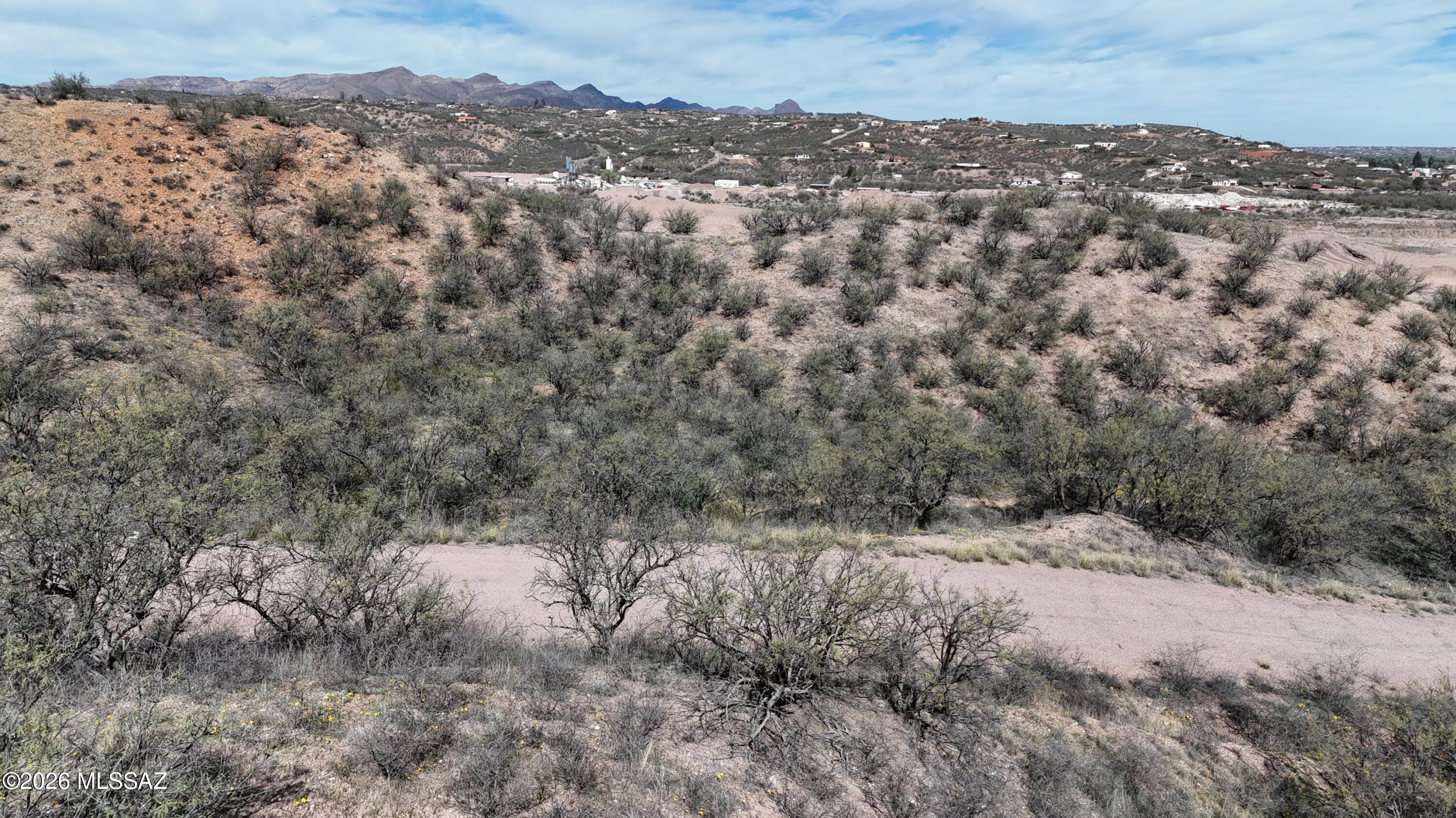 Hilltop lot in an area that does not have utilities.  Close to post office, store and highway entrance.