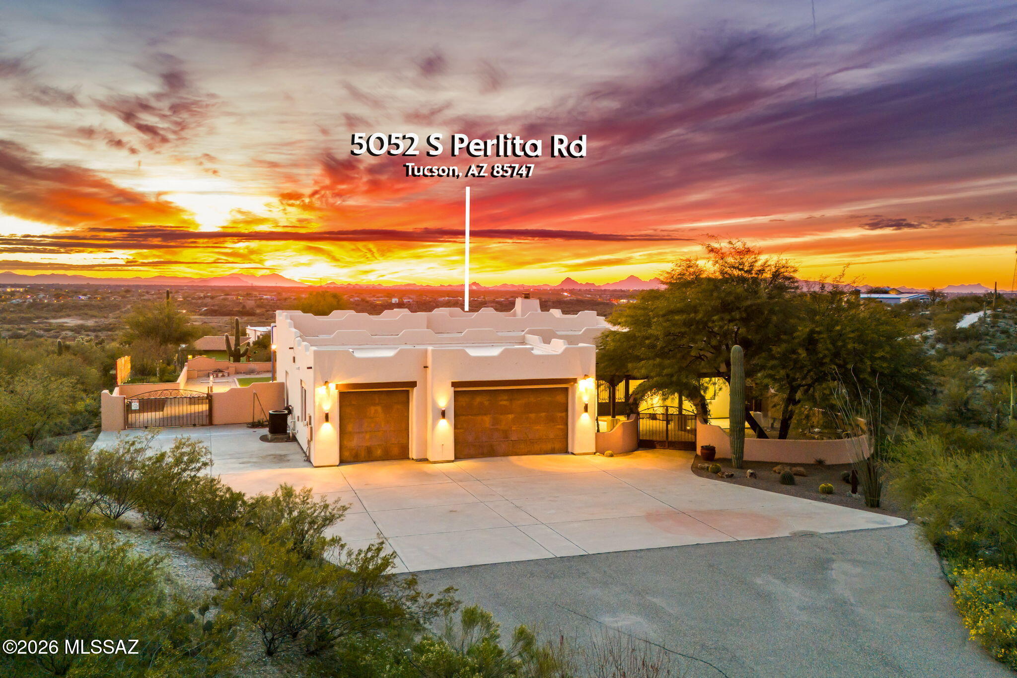 REDUCED! Custom-built 4-bedroom, den, and 3 bathrooms SW style stucco home on 3.5+ acres with pool and privatized jacuzzi just steps away from the MBD. This hilltop home affords clear views of the desert floor as well as the Santa Catalina, Tucson, Santa Rita and Rincon mountain ranges. Easy access to shopping, medical facilities, Mt Lemmon, Saguaro East Nat'l Monument and more. Biking, hiking and horse-riding opportunities abound. The dark, quiet night environment is perfect for star-gazing.  Firework displays from Tucson and the surrounding communities are easily enjoyed from the expansive, covered sitting areas overlooking the Art Haus. Gated courtyard in the front and multilevel back patios are accented by saguaro and totem cacti. Low care mature natural plants and wildlife abound. Open floorplan complemented by very large windows throughout, viga beams, 12' ceilings, 8' alder doors and cabinetry, single honeycomb wood-burning fireplace in the great room, ceiling fans in all rooms, large kitchen with island/copper prep sink and large pantry. Split design bedrooms are generous. MBD *(16' x 20') with a huge bathroom has a jacuzzi bathtub, walk-in closet, separate restroom and multi-headed walk-in shower. Large laundry room with LG washer/dryer and microwave offers access to the 3-vehicle garage with 240 V outlet. RV parking/240 V hookup/clean-out on the SE side of the home. *Room measurement provided by seller.