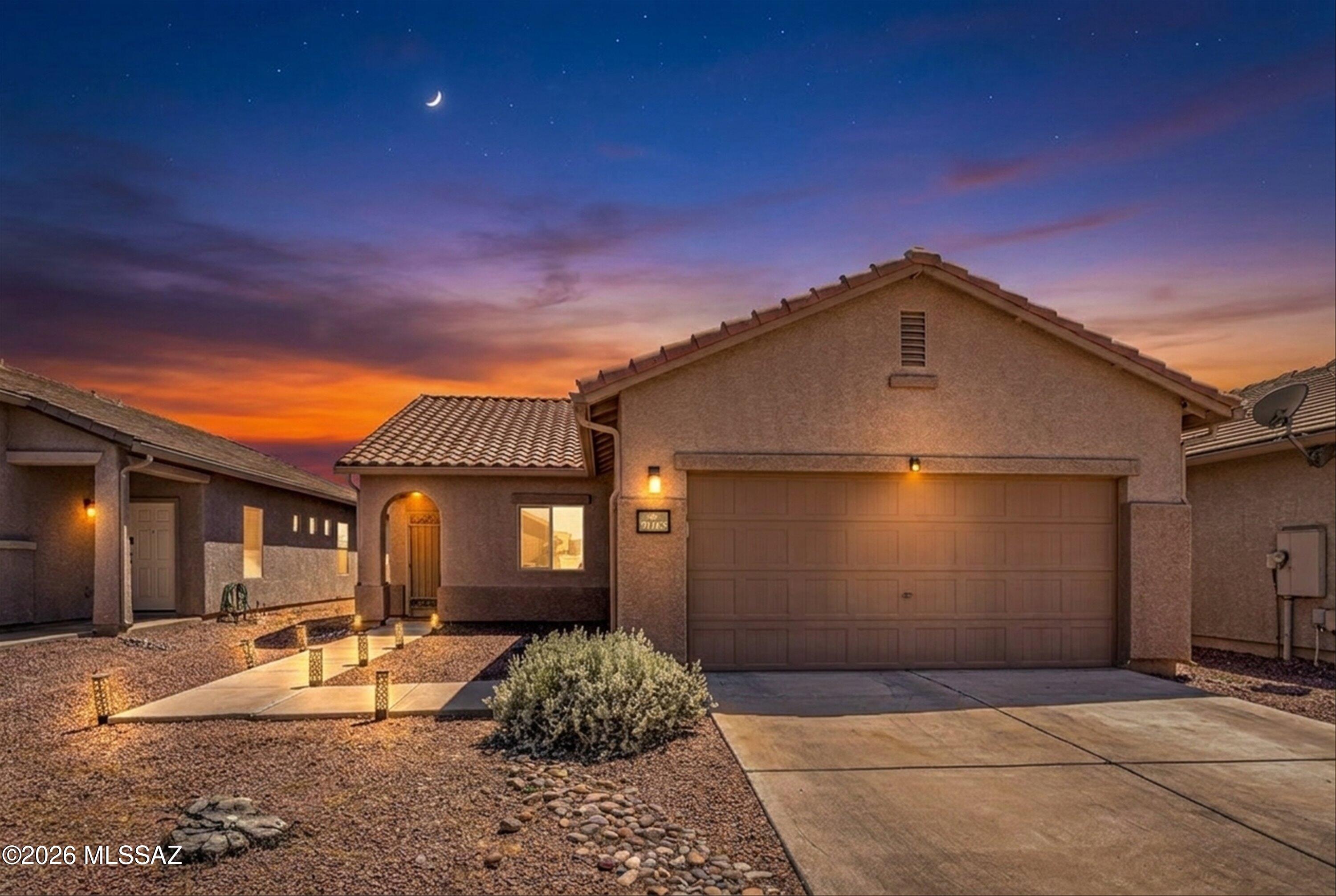 Discover the perfect blend of comfort and convenience in this immaculate single-story home located in Red Rock Village. This move-in ready 3-bedroom, 2-bath residence offers a bright, functional layout with ceramic tile throughout for effortless living. Enjoy added privacy with no rear neighbors and direct access to a peaceful walking trail--perfect for morning strolls and sunset views. Located in a growing community with resort-style amenities including pools, parks, and sports courts. Easy access to I-10 makes commuting to Tucson, Marana, or Casa Grande seamless. A true blend of style, lifestyle, and value.