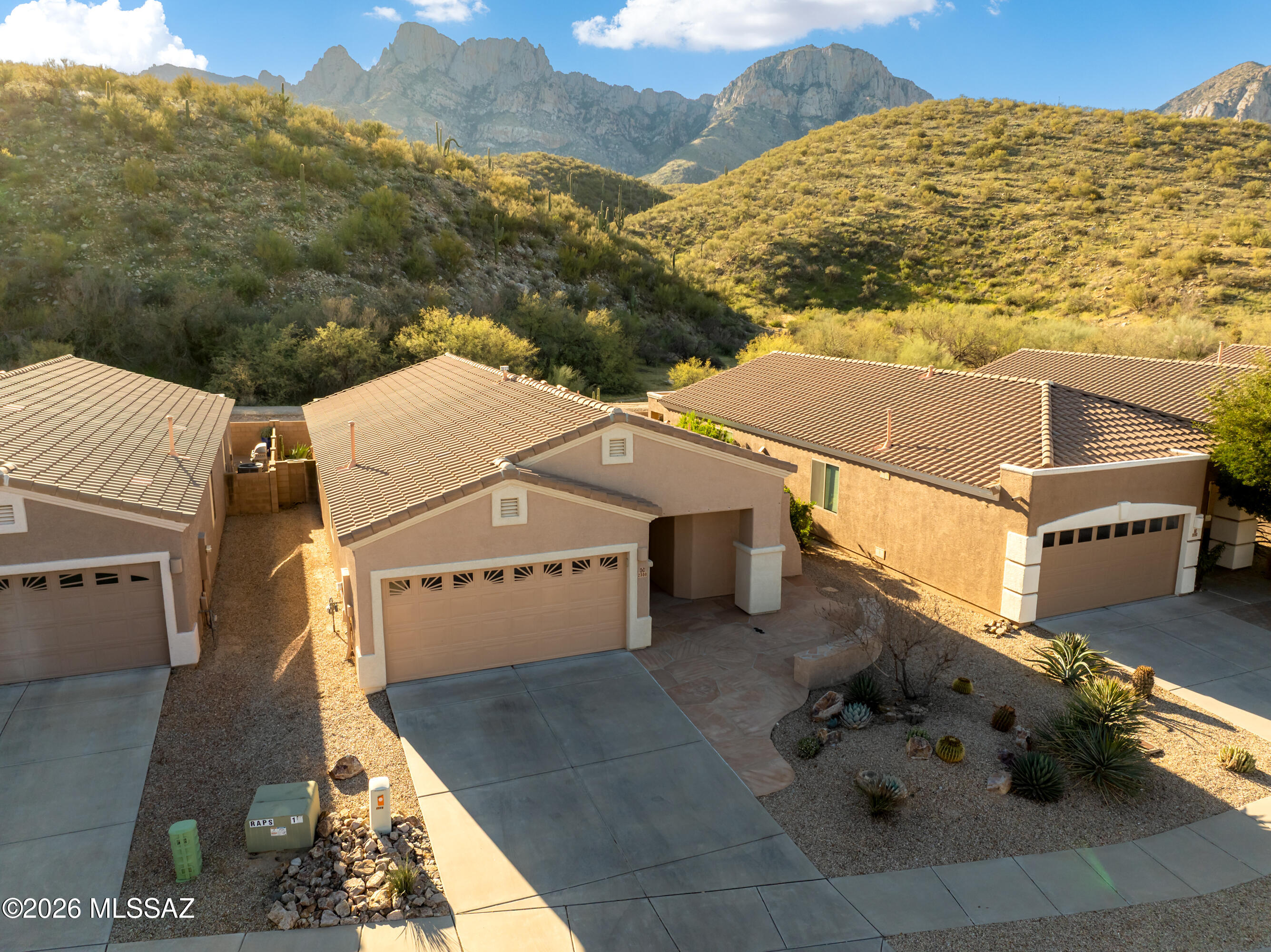 EXPANSIVE AND UNOBSTRUCTED BACKYARD VIEW TO TABLE TOP MOUNTAIN IN THE CATALINAS from one of the select properties in the back quiet corner of Rams Pass. This wonderful, original owner home features 3 bedrooms and two baths with split sleeping areas, an open floor plan, den and a beautiful updated kitchen featuring quartz countertops. One bedroom features a built-in murphy bed for guests. Property backs up to open space and is located less than one mile from the Catalina State Park. The home is within minutes of convenient shopping, restaurants and the Basis Charter School. The neighborhood boasts a park, adjacent hiking trails, friendly neighbors and is a safe beautiful place nestled at the foot of the mountains.