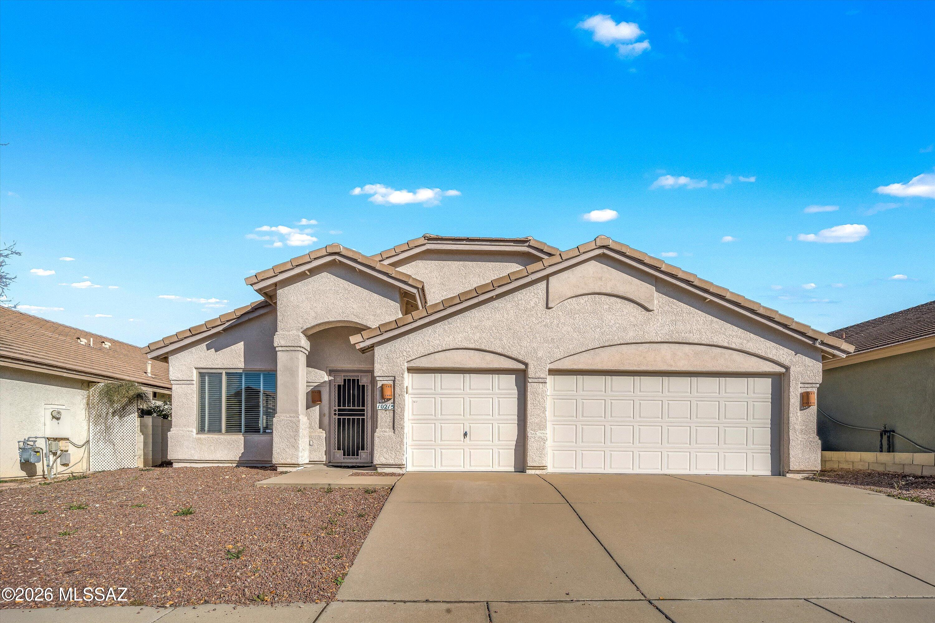 Move-in ready 3BED/2BATH/3CAR Eastside home with pool! Bright & open with high vaulted ceilings & natural light. The kitchen features granite countertops, stainless steel appliances & dark painted cabinetry. Split-bedroom plan for extra privacy in owner's suite. Owner's ensuite features soaking tub & walk-in shower. The backyard patio is covered with pull down solar screens. Beautifully landscaped with desert plants & pavers. Pool is fenced, perfect for family's with small children. Come check out this beautiful home!