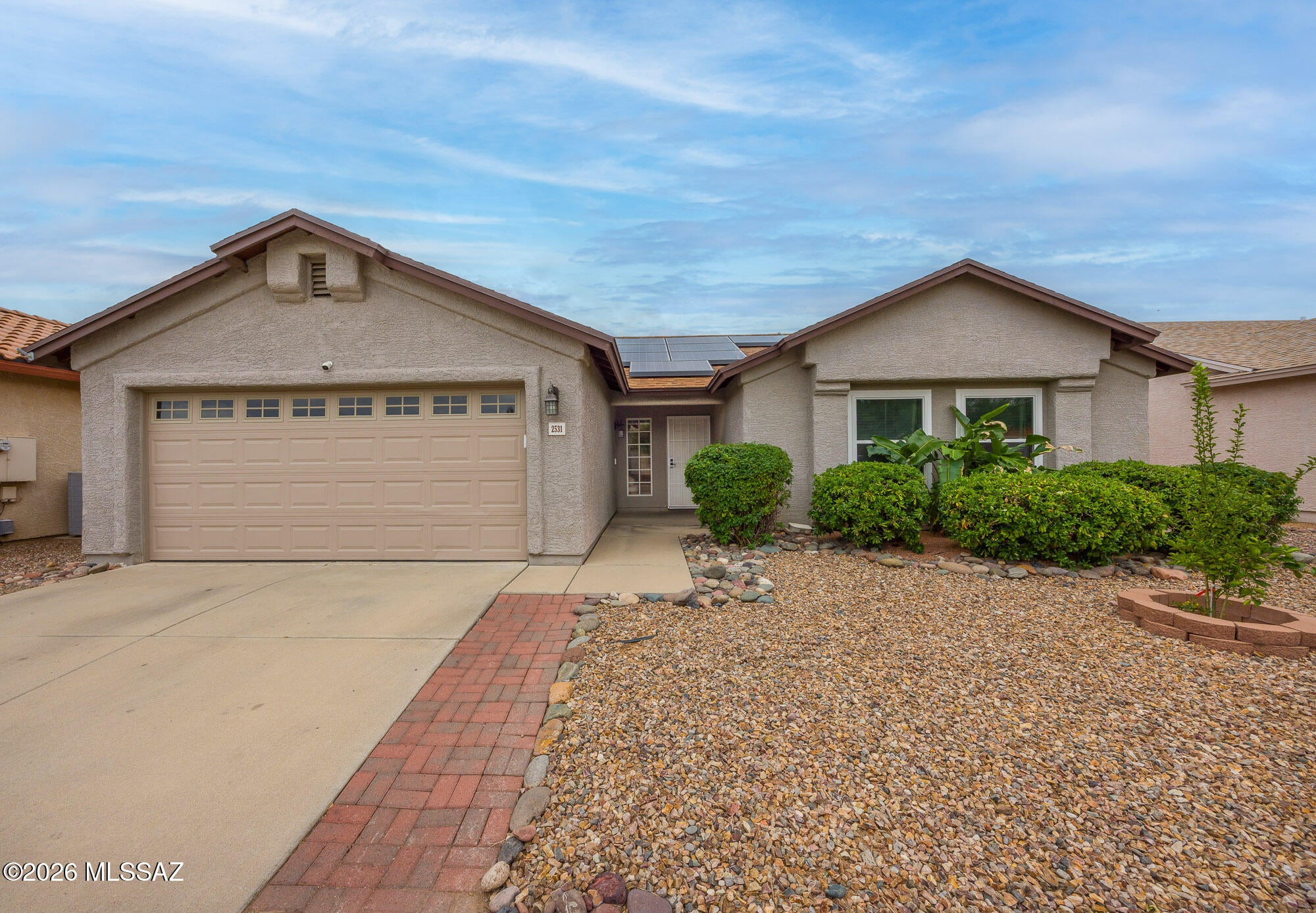 Beautiful 3 bd 2 bath home in North Casas Adobes border with Oro Valley. Tastefully upgraded with designer touches and neutral paint. Modern kitchen with granite countertops, island and breakfast bar. Open, spacious floor plan with vaulted ceilings and flexible living and dining spaces. Spacious Master Suite with walk-in closet and dual sinks in bathroom. Updated backyard with sparkling pool to enjoy with friends and family. Catalina Mountain views. Convenient laundry room inside and 2 car garage. Location, Location, Location.