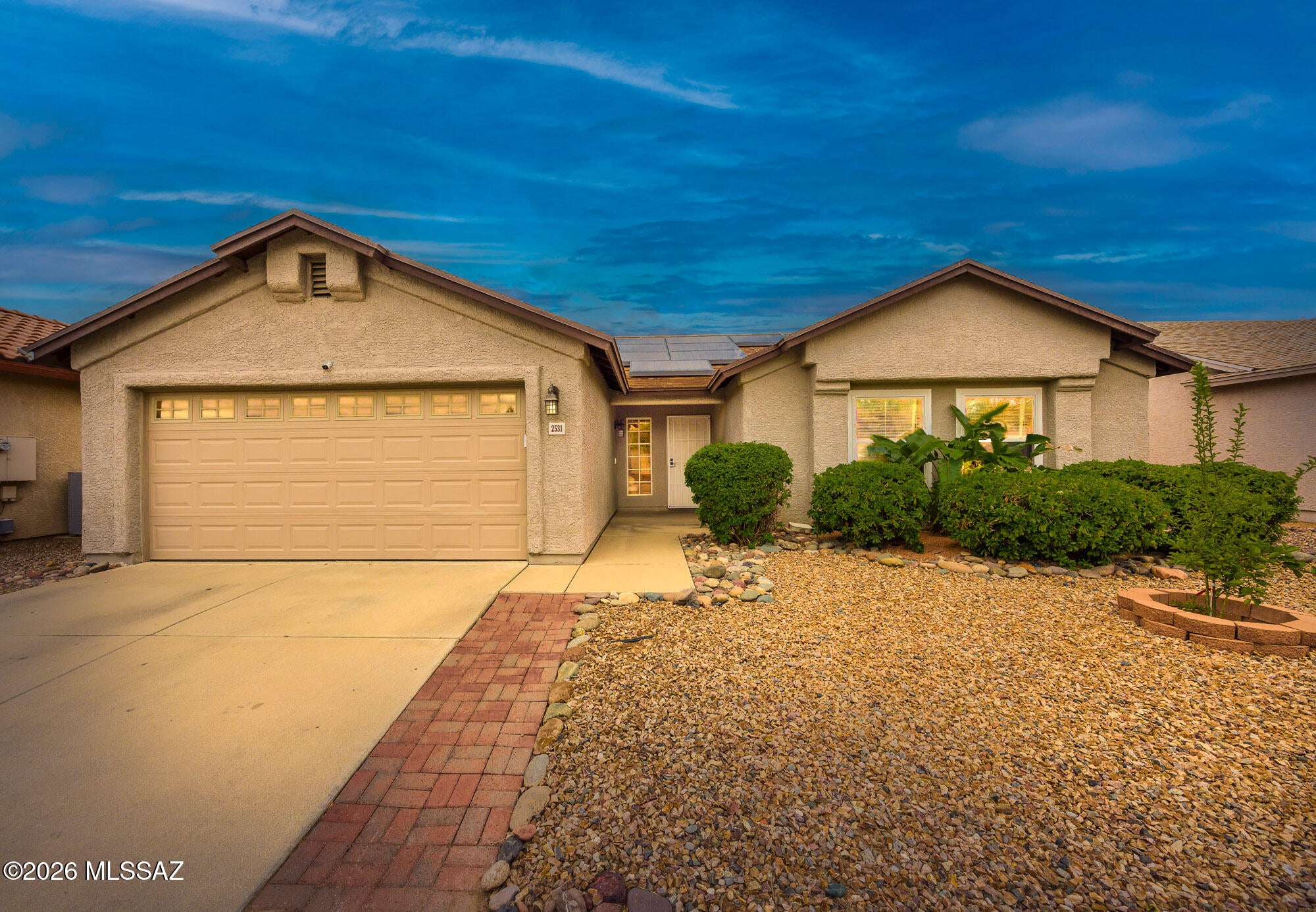 Beautiful 3 bd 2 bath home in North Casas Adobes border with Oro Valley. Tastefully upgraded with designer touches and neutral paint. Modern kitchen with granite countertops, island and breakfast bar. Open, spacious floor plan with vaulted ceilings and flexible living and dining spaces. Spacious Master Suite with walk-in closet and dual sinks in bathroom. Updated backyard with sparkling pool to enjoy with friends and family. Catalina Mountain views. Convenient laundry room inside and 2 car garage. Location, Location, Location.