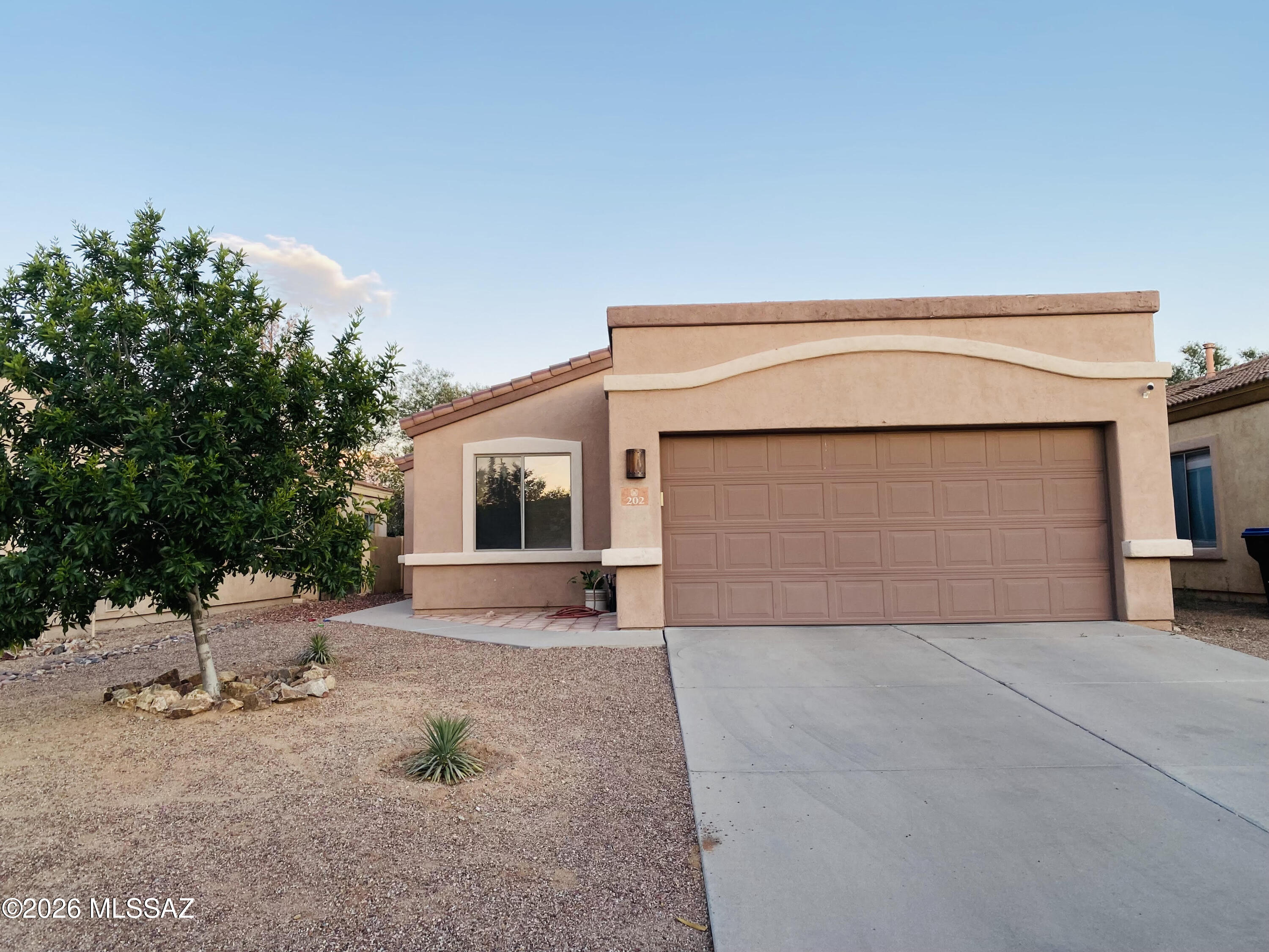 Prime location. This home offers a blend of convenience and tranquility. Short distance from the scenic lake, you'll enjoy easy access to shopping centers, restaurants, schools, and the local casino, all while being minutes from I-19 for quick commutes. The cul-de-sac location ensures a peaceful, low-traffic environment, perfect for families, pets.

Inside, the main living area features a spacious, great room with a fireplace and open-concept kitchen. Pull out cabinets. Wide hallways, tile floors throughtout high traffic areas, carpet in  bedrooms.Ceiling fans. Main bedroom boasts; walk in closet, garden tub , separate shower, executive height, double sink vanity. Laundry room. Extended garage