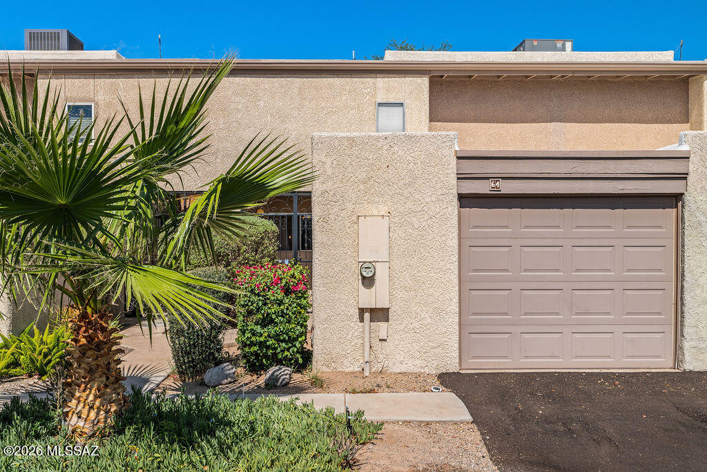 This is it!  The home you've been looking for! Beautifully updated 2-story, 2 bd, 2 ba in
Pima Park/Riverview Condominiums. Lower level has kitchen with newer appliances, granite c/tops and pass-thru to the dining room. Spacious great room features dining and living areas with vaulted ceilings. wood floors, updated lighting, and a beehive fireplace w/ custom tile, second bedroom, and full bath w/ dark cherry cabinets, granite c/top, skylight and tile surround. Upper-level boasts a large master suite with a loft view of downstairs, sitting area, huge walk-in closet, master bath & private balcony with a view. Private yard has Saltillo tile patio, fountain & gate that leads to grass courtyard and community pool.  Furnished/unfurnished option avail. Some or all of the furnishings can be sold separately through a bill of sale. Otherwise, furniture can be completely removed prior to close.
