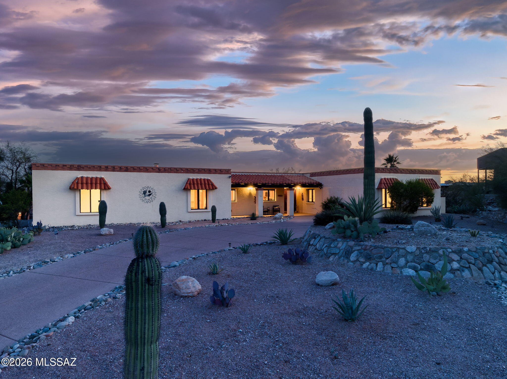 Outstanding home located on quiet cul-de-sac in sought after Sabino Hills neighborhood. Lovingly cared for by the original owners, this solid construction Arena home will not disappoint. Double door entry welcomes you inside to the light, bright and spacious home featuring vaulted ceilings, living room and dining room with wood floors and stunning views. Family room off the kitchen beckons you to relax and unwind with a cozy brick fireplace flanked by built-in bookcases and beamed ceilings. Kitchen with solid oak cabinets and quaint pass through to the dining room. Wood Pella windows and sliding doors throughout. Venture outside to relax on the deep covered back patio overlooking the low maintenance desert landscaped backyard, refreshing pool and spa and to take in the city light and mountain views! Rare find!