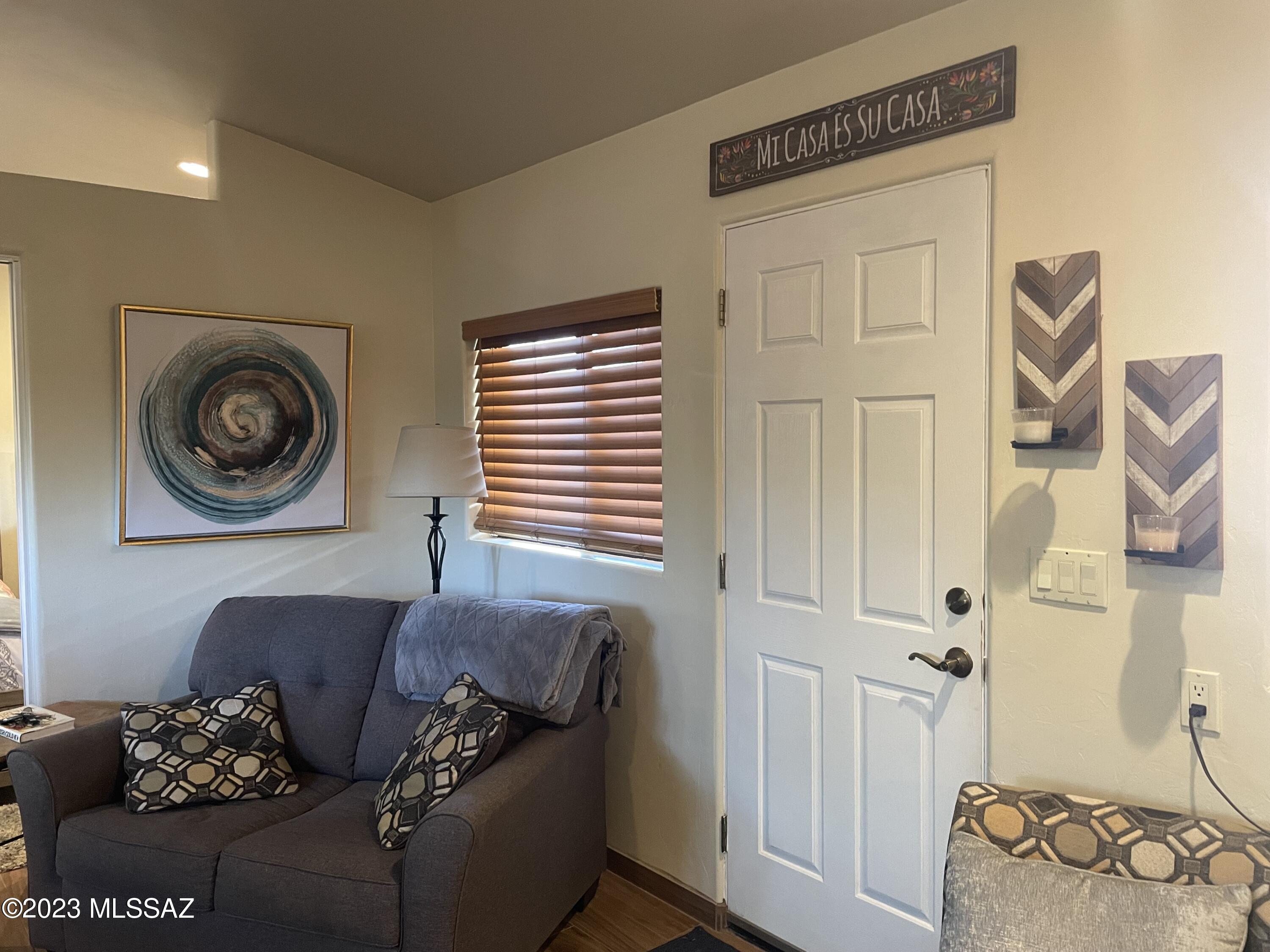 Furnished Guest House Centrally located here in Tucson-no carpeting!
You will love the outdoor front and back patios plus shady backyard.
Kitchen is fully stocked and includes all appliances, and there is also a shared washer/dryer on the premises.
Living room, full bath, private bedroom with queen bed and large closet off bath. Includes water, trash, gas plus cable TV plus 1 covered parking space.