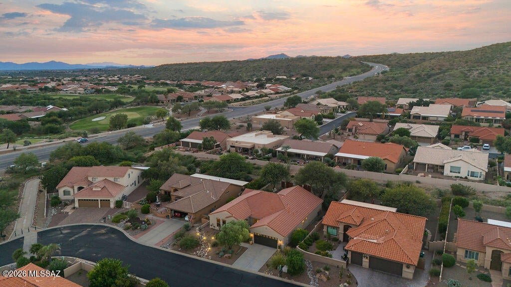 Nestled on quiet Terrace Park Dr., this beautifully remodeled 2,125 sq. ft. Silverton model offers Catalina Mountain views, privacy, and an oversized, deep lot with a peaceful backyard retreat. The thoughtfully designed 4-bedroom, 2.5-bath split floor plan provides excellent separation and privacy between the primary suite and guest accommodations. The spacious primary suite features a private sitting area, beautifully remodeled bath with a large walk-in shower, and an abundance of closet and storage space. Two additional guest bedrooms share a luxurious Jack-and-Jill bath with dual sinks, while the flexible fourth bedroom can serve as a dedicated office, den, or bonus room. A spacious dining area provides the perfect setting for holiday gatherings and entertaining.

Abundant natural light enhances the home's open, inviting feel, complemented by low-maintenance concrete overlay flooring throughout. The heart of the home is the gourmet chef's kitchen, featuring high-end appliances, custom cabinetry, a walk-in pantry, expansive countertops, and numerous pull-out drawers designed for both everyday convenience and effortless entertaining. A cozy fireplace adds warmth and character to the living space.

Step outside to enjoy the east-facing front patio with beautiful Catalina Mountain views, or unwind and entertain on the oversized, southwest-facing covered rear patio, overlooking the private backyard with mature trees providing shade. Newer HVAC, water heater, and a post-tension foundation complete this beautifully updated home, offering space, privacy, views, and a low-maintenance yard.

Experience exceptional indoor-outdoor desert living in SaddleBrooke.