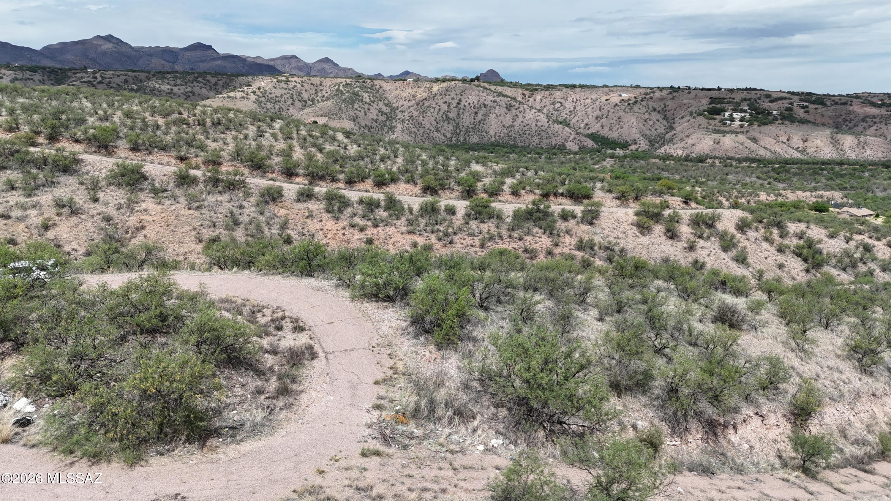 Residential lot in Rio Rico not far from the Rio Rico high school, middle school and Coatimundi Elementary school.